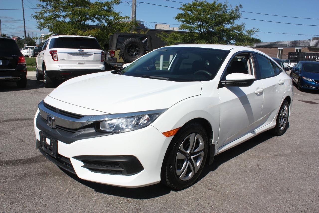 2016 HONDA CIVIC WHITE COMES WITH FULL POWER GROUP OPTIONS , BLUETOOTH, BACKUP CAMERA AND MUCH MUCH MORE, THIS VEHICLE COMES FULLY CERTIFIED, E-TEST AND ADMIN FEES ALL INCLUDED IN THE PRICE, FOR MORE INFO PLEASE CONTACT US AT 1855-350-1313 AT AA Canada INC. all of our vehicles come with a Safety Standard Certificate, Emission test plus HST. CARPROOF will be provided at the dealership ALL TRADE INS WELCOME. We also provide warranty packages and financing rates starting at 4.5% all credits types GOOD OR BAD CREDIT! Interested? We are here to serve you, call us at Toll free 1-855-350-1313 or 647-350-1313 email us at aacanadainc@gmail.com or visit us online at www.aacanadainc.com