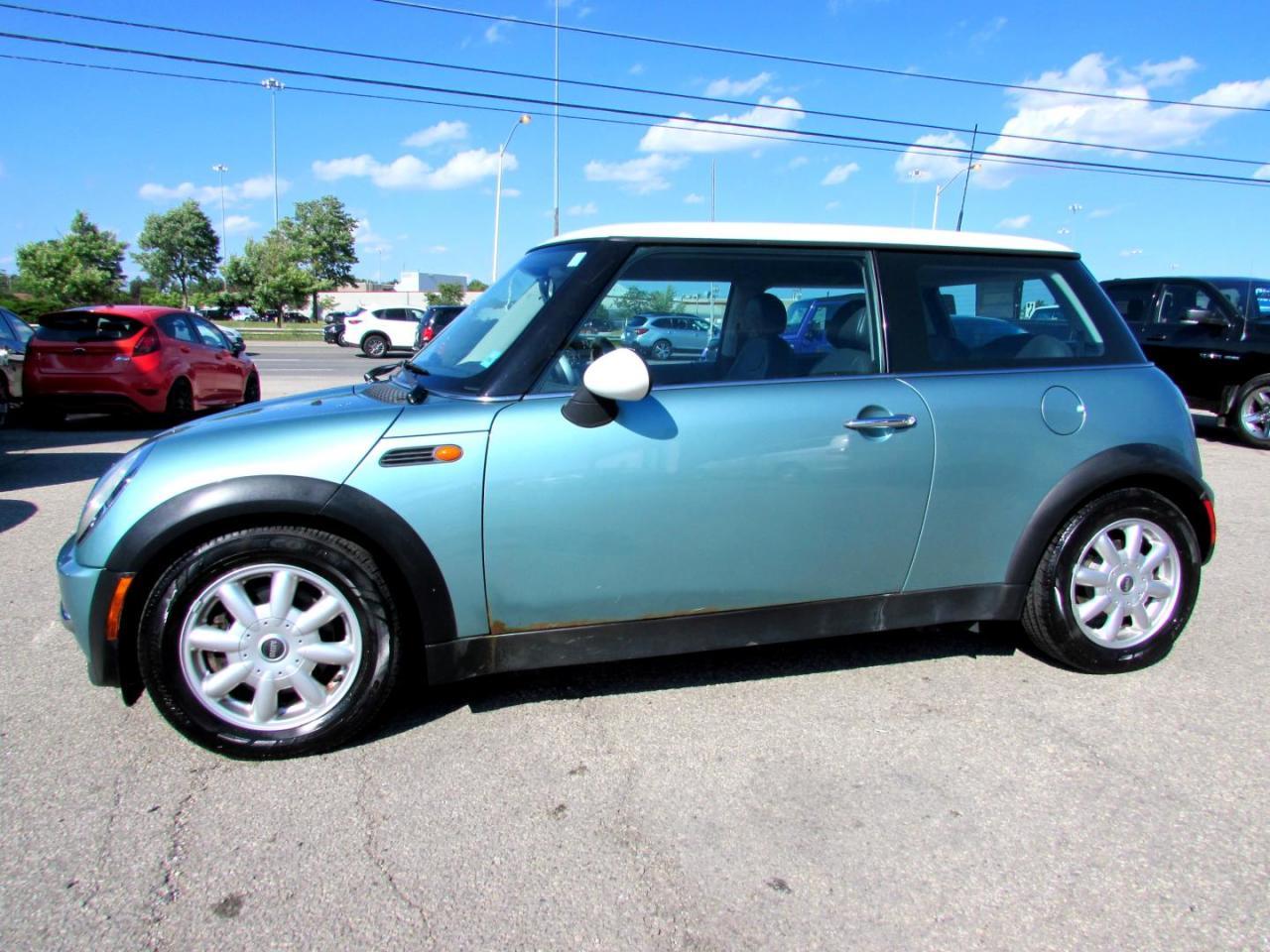 *LOW KM*Nice Clean Mini Cooper Hatchback With 5 Speed Manual Transmission, Green on Black Leather Interior. Loaded with: Power Door Locks, Power Windows, Locks, Mirrors, CD, AC Dual Climate Control, Alloys,  Power Heated Leather Bucket Seats, Keyless. Vehicle Comes With: Safety Certification, 2 Year Power Train (Engine/ Transmission) Seals & Gaskets Warranty, and Car Proof Report ALL INCLUDED!! At no extra cost to you!! Auto Moto Of Ontario @ 583 Main St E. , Milton, L9T3J2 ON. Please call for further details. 905-281-2255 ALL TRADE INS ARE WELCOMED!
We are open Monday to Friday from 10am to 7:00pm and Saturdays from 10am to 6pm, Sundays closed.