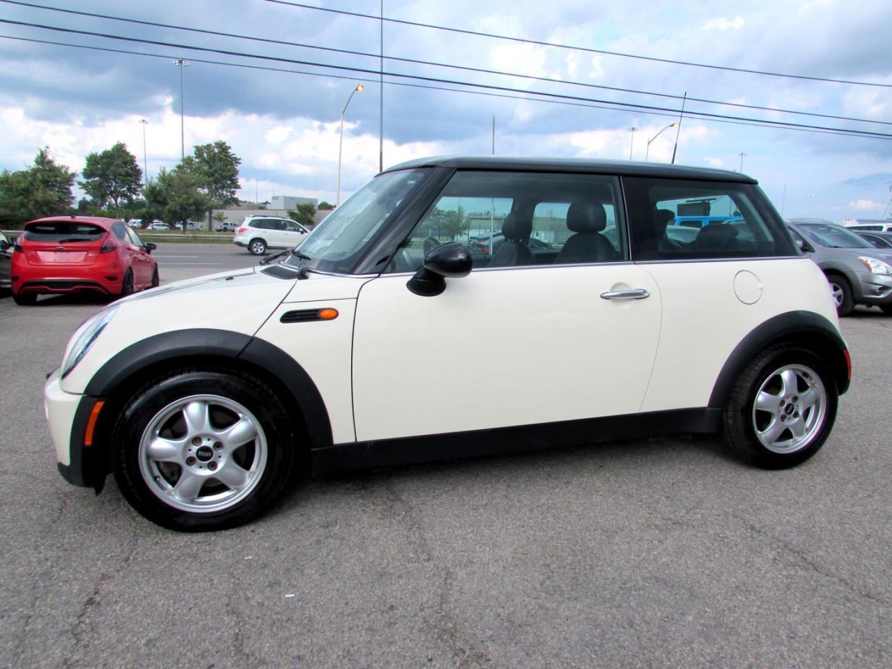 Very Clean Mini Cooper Coupe 5 Speed Transmission, White on Black Leather Interior. Loaded with:  Power Door Locks, Power Windows, Locks, Mirrors, CD, AUX, AC Dual Climate Control, Alloys,  Power Heated Leather Bucket Seats, Keyless and all the power options. 
Vehicle Comes With: Safety Certification, 2 Year Power Train (Engine/ Transmission) Seals & Gaskets Warranty, and Car Proof Report ALL INCLUDED!! At no extra cost to you!! Auto Moto Of Ontario @ 583 Main St E. , Milton, L9T3J2 ON. Please call for further details. 905-281-2255 ALL TRADE INS ARE WELCOMED!
We are open Monday to Friday from 10am to 7:00pm and Saturdays from 10am to 6pm, Sundays closed.