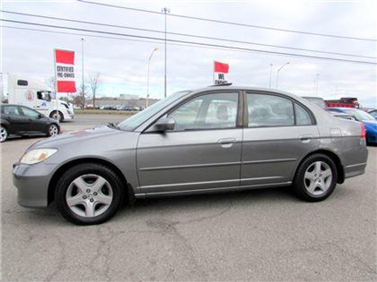 Honda Civic SI 1.7L With Automatic Transmission, Silver on Grey Interior. Loaded with: Power Door Locks, Power Windows, CD, AC. Auto Moto Of Ontario @ 583 Main St E. , Milton, L9T3J2 ON. Please call for further details. 905-281-2255, 
We are open Monday to Friday from 10am to 7:00pm and Saturdays from 10am to 6pm, Sundays closed.
ALL TRADE INS ARE WELCOMED!! 
ALL TRADE-IN VEHICLES OFFERED FOR SALE AS TRADED. THE VEHICLE WAS DRIVEN DAILY PRIOR TO BEING TRADED IN. 

We are required by OMVIC to state that this vehicle is being sold AS IS, Not Certified, and is not represented as being in a road worthy condition, mechanically sound or maintained at any guaranteed level of quality.