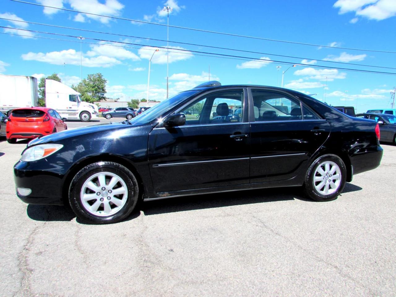 Very Clean Toyota Camry LE 3.0L Sedan With Automatic Transmission, Black on Grey Leather Interior. Loaded with: Power Door Locks, Power Windows, CD, AC, Heated Leather Bucket Seats, Sunroof, Alloys, Steering Mount Controls. Auto Moto Of Ontario @ 583 Main St E. , Milton, L9T3J2 ON. Please call for further details. 905-281-2255, ALL TRADE INS ARE WELCOMED!! ALL TRADE-IN VEHICLES OFFERED FOR SALE AS TRADED. THE VEHICLE WAS DRIVEN DAILY PRIOR TO BEING TRADED IN. We are required by OMVIC to state that this vehicle is being sold AS IS, unfit, not e-tested and is not represented as being in a road worthy condition, mechanically sound or maintained at any guaranteed level of quality. The vehicle may not be fit for use as a means of transportation and may require substantial repairs at the purchasers expense. It may not be possible to register the vehicle to be driven in its current condition