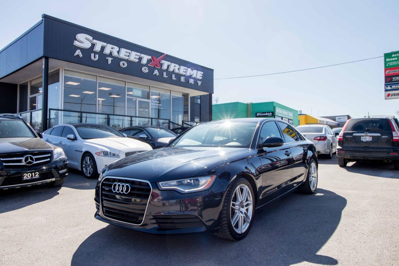 <p>Brilliance takes many forms in the Audi A6. In our particular 2014 Audi A6, it has a turbocharged 2.0 litre, 252HP four-cylinder paired to an 8-speed automatic transmission. The A6 has a sleek shape with a long nose and a swept-back roofline. Front seat space is great, with nicely padded seats. Rear seats are very roomy, and so comfortable you can sleep in the back.&nbsp;</p>
<p>**A WHEEL BALANCE, ALIGNMENT, & OIL CHANGE IS INCLUDED IN EVERY CERTIFIED VEHICLE**</p>
<p>Finance this vehicle for as little as $257.96 bi-weekly for 72 months at 4.99% O.A.C (estimated finance rate) with $0 down subject to approvals for a total cost of borrowing of only $5437.76. Call 905.554.8628 for more details and conditions.</p>
<p>The monthly payment on the vehicle has been calculated only for the purpose of comparison and is not an offer to provide a loan. This comparison is based on the bi-weekly payment of 72 months for all 2014 car models at 4.99% O.A.C, excluding licensing and additional fees. The APR rate applied is only an estimate, which may be below or above the rate you actually receive.</p>
<p>&nbsp;</p>
<p>WARRANTY COVERAGE can be added at an additional cost. StreetXtreme offers a wide range of coverages to suit all your needs. We are also an authorized service centre for all our warranty companies for your convenience. A true one-stop-shop!</p>
<p>&nbsp;</p>
<p>This vehicle will come SAFETY CERTIFIED & FULLY DETAILED</p>
<p>HST + LICENSING EXTRA</p>
<p>We are an OMVIC & UCDA member so buy with confidence and more importantly... a PEACE OF MIND.</p>
<p>&nbsp;</p>
<p>StreetXtreme strives to purchase our vehicles at the lowest cost so we can retail it for the lowest price. We spend quality time doing our research to make sure our prices are competitive and for this reason, our prices are HAGGLE FREE. Thank you for understanding.</p>
<p>&nbsp;</p>
<p>CALL NOW at (905) 554-8628 - Press #1 for Sales Department OR you can also call:</p>
<p>Kevin @ (647) 927-8780</p>
<p>Tommy @ (416) 720-7721</p>
<p>Nathan @ (647) 575-8892</p>
<p>&nbsp;</p>
<p>For more details in regards to financing, please visit: https://www.streetxtreme.ca/financing-landing/</p>
<p>To view our full inventory list, please visit: https://www.streetxtreme.ca/vehicles/</p>
<p>&nbsp;</p>
<p>StreetXtreme Auto Gallery</p>
<p>5829 Hwy 7 East</p>
<p>Markham, Ontario</p>
<p>L3P 1A5</p>
<p>(905) 554-8628 Ext. 1</p>
<p>&nbsp;</p>
<p>StreetXtreme Street Extreme StreetExtreme Street Xtreme</p>