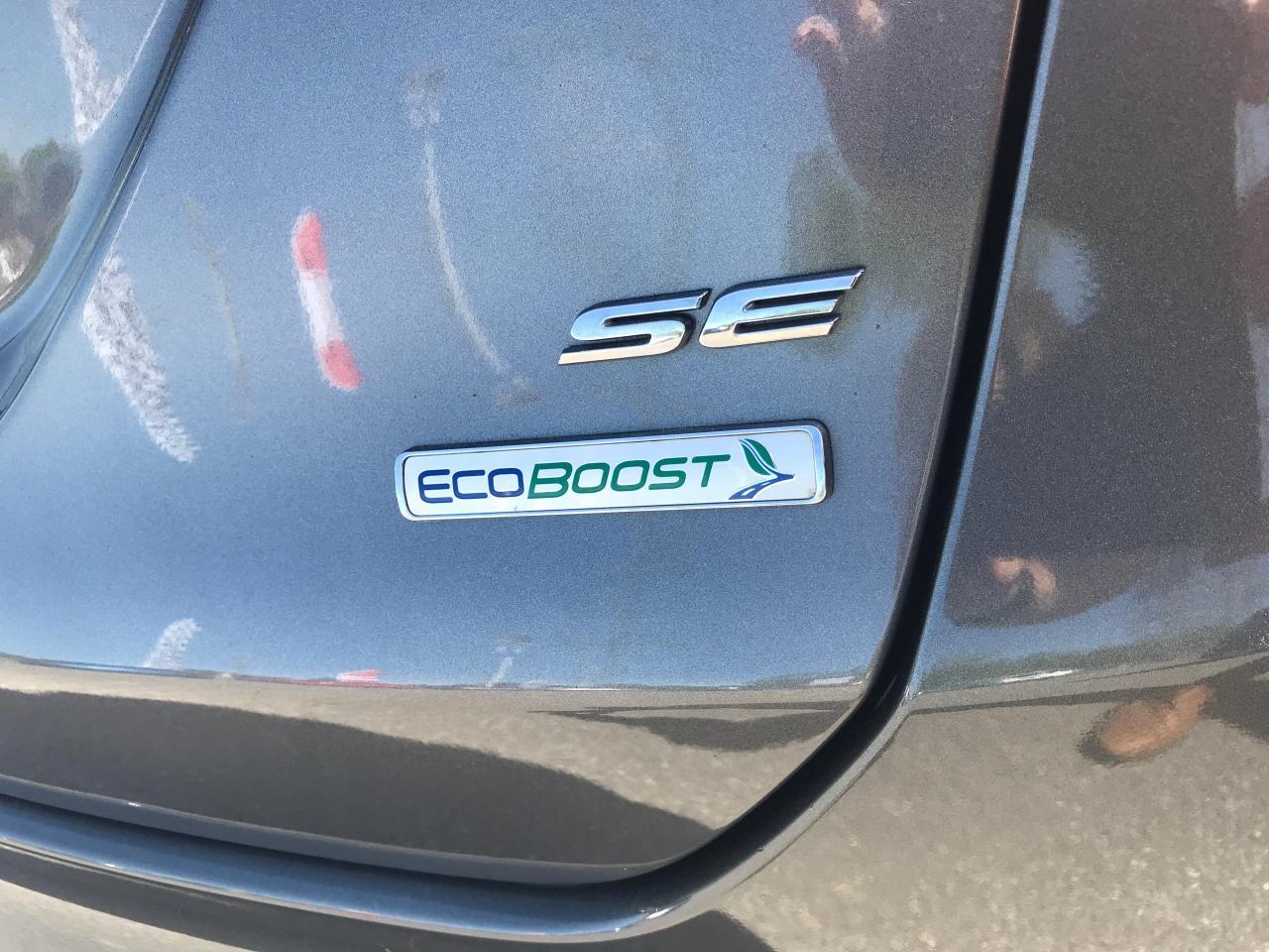 671077