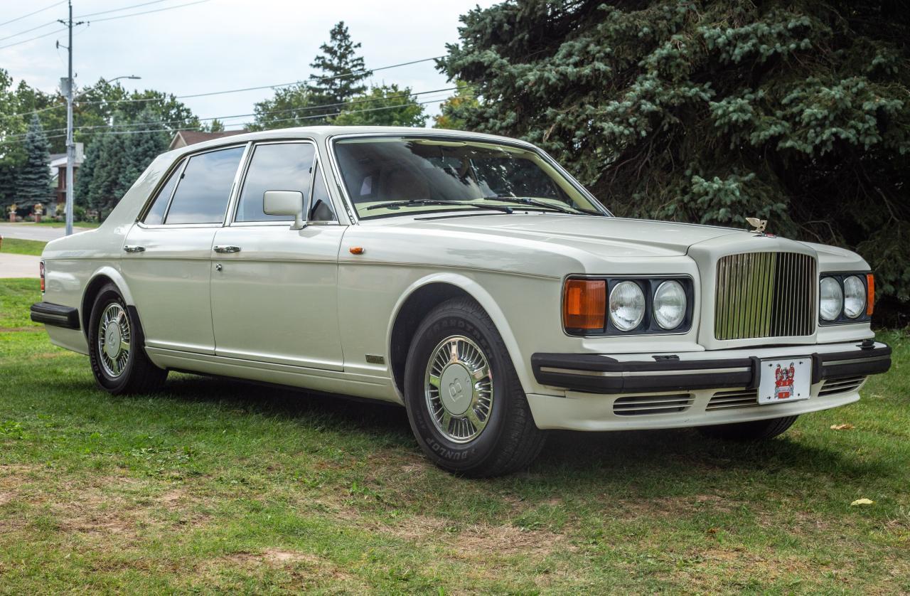**ALL TRADES WELCOME!!** 
1990 Bentley TURBO R!! Very Well Kept and Services up to date! 

Your Chance to own a Classic Bentley Turbo R with no issues! VERY Low Kilometres sitting at 87,***. This car has been EXTREMELY well kept and NEVER winter driven. Spent most of its life in Florida. NO accidents or any claims. Clean CarFax. 
Hit the Market in 1990 with a whooping price tag starting @ $195,000 USD!!

Extremely clean inside and out and in Amazing Shape!

Body is Straight and Nothing to hide.
Priced to sell! REDUCED FROM $22,995 to ONLY $17,995 
Come check it out before its gone!!! 

Safety Certified & Etested 

Call today 

**FINANCING AVAILABLE For 10 years or newer vehicles ** 
Over 40 Vehicles in stock!!! 

OLYMPIA MOTORS 
Located @ 4600 Montrose Rd, Niagara Falls