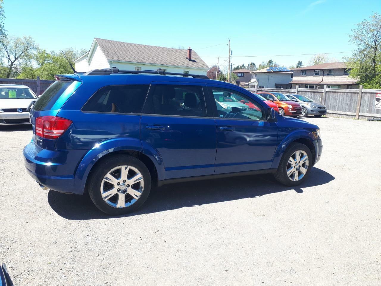 <p>2010 DODGE JOURNEY-SXT-7 SEATERS -V6 -BACK UP CAMERA- Remote Starter-DVD- Navigation -ALLOYS- NO ACCIDENT-Pwr Seat-Heated Seats ...ect <br /><br />WE FINANCE EVERYONE REGARDLESS OF CREDIT RATING, WHETHER YOU HAVE GREAT CREDIT, NO CREDIT, SLOW CREDIT, BAD CREDIT, BEEN BANKRUPT, OR DISABILITY, OR ON A PENSION, OR YOU WORK BUT PAID CASH- WE HAVE MULTIPLE LENDERS THAT WANT TO GIVE YOU A CAR LOAN We are a proud member of OMVIC and UCDA. Car proof reports are available upon request We welcome your mechanic inspection before purchase for your own peace of mind !!! We also welcome all trade-ins For more information please visit our website at http://oshawafineautosale.webs.com/ or call 2896531993 .Many Cars,Trucks and Vans Available to choose from. Oshawa Fine Auto Sales. 766 Simcoe Street South, in Oshawa , just south of 401 and Bloor street, corner of Erie street and Simcoe-<br /><br /><br />Additional Information<br />3.5L MPI 24-VALVE HO V6 ENGINE|Automatic headlamps|Black side roof rails|Black sill|Black-out tape|Body-colour door handles|Body-colour fascias|Body-colour mirrors|Bright grille|Compact spare tire|Fog lamps|Front air dam|Front license plate bracket|Halogen quad headlamps|Headlamps off time delay|Hood insulation|Pwr heated fold-away mirrors|Rear wiper w/washer|Sunscreen glass|Tinted windshield|Variable intermittent wipers|240-KM/H speedometer|2nd row in-floor storage bins|6-way pwr driver adjust|Active head restraints|Cargo net|Cargo tie down loops|Door sill scuff pads|Dual glove boxes -inc: cooled upper storage|Dual visors w/illuminated mirrors|Floor carpeting|Floor console w/armrest|Front/rear floor mats|Glove box lamp|Grocery bag hooks|Illuminated cupholders|Illuminated entry|Instrument cluster w/tachometer|Instrument panel colour-keyed bezel|Instrument panel cooler|Instrument panel storage bin|Interior observation mirror|Leather-wrapped shift knob|Leather-wrapped steering wheel|Liftgate flood lamp|Low washer fluid warning signal|Manual driver lumbar|Overhead console|Passenger assist handles|Passenger fold-flat seat|Passenger seat cushion storage bin|Portable rechargeable trouble light|Pwr windows w/1-touch up & down|Rear armrest -inc: storage; cupholder|Rear reclining fold-flat seat|Rear window defroster|Seat belt & key warning buzzer|Security alarm|Sentry Key theft deterrent system|Speed control|Steering wheel audio controls|Tilt/telescopic steering column|Tip start|Trip computer -inc: outside temp; compass|Warning chime|160-amp alternator|3.5L MPI 24-valve HO V6 engine|4-wheel anti-lock disc brakes|525 CCA maintenance-free battery|Dual bright exhaust tips|Engine block heater|Front wheel drive|Pwr rack & pinion steering|Touring suspension|Trailer sway damping|(6) speakers|Audio input jack|Removable short mast antenna|Advanced multi-stage front airbags -inc: front passenger occupant sensor|Brake assist|Brake/park interlock|Child seat anchor system; LATCH ready|Child seat upper tether anchors|Dual-note horn|Electronic roll mitigation|Rear door child protection locks|Supplemental front side airbags|Supplemental front/rear side-curtain airbags|Tire pressure monitoring warning lamp</p>
