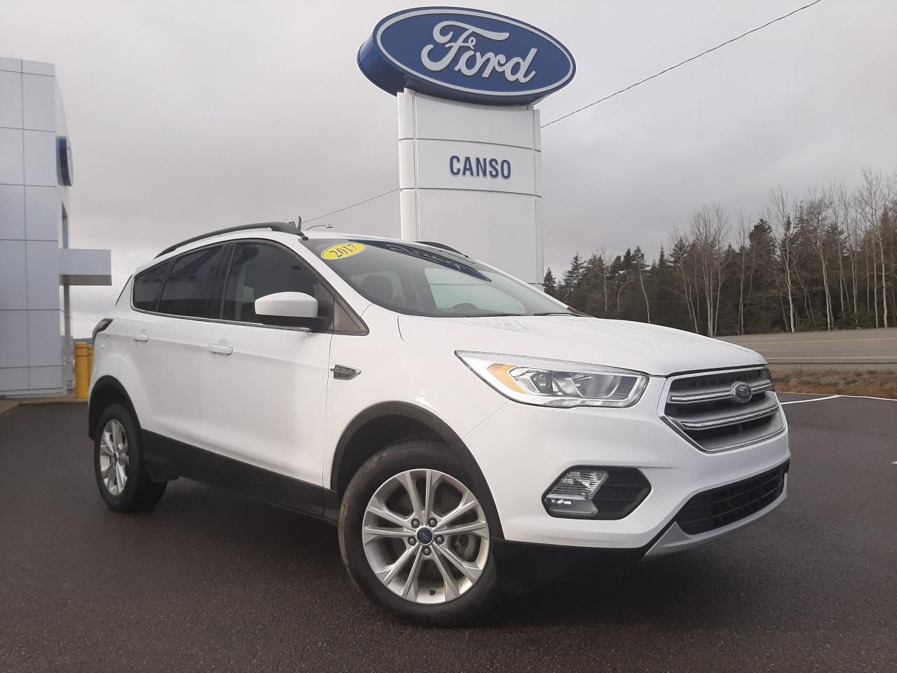 <p>2017 Ford Escape SE 4D Sport Utility 4WD<br />EcoBoost 2.0L I4 GTDi DOHC Turbocharged VCT<br />Oxford White<br /><br />Call (902) 625-1338 or (888) 625-1338 for more information, or come by Canso Ford and drive it for yourself!<br /><br />Certified. Odometer is 28346 kilometers below market average! One Owner, Fresh MVI, Winter tires and rims included, 4WD, 10-Way Power Drivers Seat, 10-Way Power Passenger Seat, 9 Speakers, AM/FM radio, Automatic temperature control, Black Roof Side Rails, Block heater, CD player, Class II Trailer Tow, Electronic Stability Control, Equipment Group 201A, Exterior Parking Camera Rear, Front dual zone A/C, Front fog lights, Fully automatic headlights, Halogen Projector Headlamps, Heated Cloth Front Bucket Seats, Heated door mirrors, Heated front seats, Illuminated entry, Knee airbag, Low tire pressure warning, Panic alarm, Power door mirrors, Power One-Touch Up/Down Front/Rear Windows, Power windows, Rear window defroster, Rear window wiper, Remote keyless entry, Reverse Sensing System, SE Convenience Package, Speed control, Split folding rear seat, Spoiler, Steering wheel mounted audio controls, SYNC 3 Communications & Entertainment System, SYNC Connect, Telescoping steering wheel, Tilt steering wheel, Tonneau Cover, Traction control, Trip computer, Wheels: 17 Sparkle-Painted Aluminum.<br /><br />Ford Certified Details:<br />&nbsp; * Roadside Assistance available 24/7, 365 days a year<br />&nbsp; * 172-Point Inspection<br />&nbsp; * CARFAX Vehicle History Report. Complimentary 3-Month SiriusXM Select+ Trial Subscription<br />&nbsp; * 12-month or 20,000 kilometres (whichever comes first) Comprehensive Limited Warranty Coverage<br />&nbsp; * Get As Low As 1.9% APR Financing on Ford Certified PreOwned Vehicles<br /><br />Benefits of shopping at Canso Ford: <br />- Carfax report with every quality pre-owned vehicle <br />- Full tank of fuel with every quality pre-owned vehicle <br />- 1-Year Tire and Rim Protection with every quality pre-owned vehicle.</p>