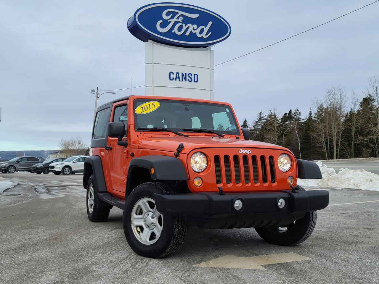 <p>2015 Jeep Wrangler Sport 2D Sport Utility 4WD<br />Pentastar 3.6L V6 VVT<br />Sunset Orange Pearlcoat<br /><br />Call (902) 625-1338 or (888) 625-1338 for more information, or come by Canso Ford and drive it for yourself!<br /><br />Odometer is 50226 kilometers below market average! 16 x 7 Slot-Spoke Styled Steel, 6 Speakers, Black Jeep Freedom Top Hardtop, Cloth Bucket Seats, Cruise Control, Freedom Panel Storage Bag, Front fog lights, Rear Window Defroster, Rear Window Wiper/Washer, Tilt steering wheel, Tinted Rear Quarter & Liftgate Windows, Tubular Side Steps, Uconnect 130 AM/FM/CD/MP3.<br /><br />Benefits of shopping at Canso Ford: <br />- Carfax report with every quality pre-owned vehicle <br />- Full tank of fuel with every quality pre-owned vehicle <br />- 1-Year Tire and Rim Protection with every quality pre-owned vehicle.</p>
