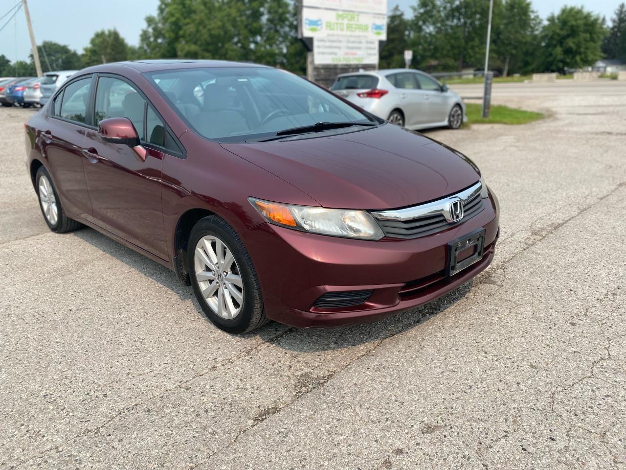 <p><span style=text-decoration: underline;><span style=font-size: 14pt;><strong>2012 Honda Civic EX - AUTOMATIC&nbsp;</strong></span></span></p><p>&nbsp;</p><p><span style=font-size: 14pt;><strong>CARS IN LOBO LTD. (Buy - Sell - Trade - Finance)&nbsp;<br />TEXT 24/7 - 226 927 2414<br />Office# - 519 666 2800</strong></span></p><p><span style=font-size: 12pt;>-> LOCATION&nbsp;<a title=Location  href=https://www.google.com/maps/place/Cars+In+Lobo+LTD/@42.9998602,-81.4226374,15z/data=!4m5!3m4!1s0x0:0xcf83df3ed2d67a4a!8m2!3d42.9998602!4d-81.4226374 target=_blank rel=noopener>6355 Egremont Dr N0L 1R0 - 6 KM from fanshawe park rd and hyde park rd in London ON</a><br />-> Quality pre owned local vehicles. CARFAX available for all vehicles&nbsp;<br />-> Certification is INCLUDED in price or ask about our AS IS pricing<br />-> We offer Extended Warranty on our vehicles inquire for more Info<br /></span><span style=font-size: small;><span style=font-size: 12pt;>-> All Trade ins welcome (Vehicles,Watercraft, Motorcycles etc.)</span><br /><span style=font-size: 12pt;>-> Financing Available on most vehicles&nbsp;<a title=FINANCING APP href=https://carsinlobo.ca/fast-loan-approvals/ target=_blank rel=noopener>APPLY NOW -> FINANCING APP</a></span><br /><span style=font-size: 12pt;>-> Register & license vehicle for you (Licensing Extra)</span><br /><span style=font-size: 12pt;>-> No hidden fees, Pressure free shopping & most competitive pricing.&nbsp;<br /></span></span></p><p><span style=font-size: small;><span style=font-size: 12pt;>MORE QUESTIONS? FEEL FREE TO CALL (519 666 2800)/TEXT (226 927 2414)/EMAIL (Sales@carsinlobo.ca)</span><br /></span></p>