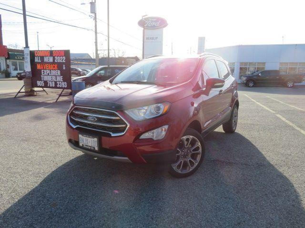 <p>Get ready to turn heads in this stunning new 2021 Ford EcoSport Titanium from Heaslip Ford. This stylish SUV boasts a ruby red metallic exterior, a luxurious ebony black leather interior, and an array of features designed to elevate your driving experience. The EcoSport Titanium offers a perfect blend of practicality and sophistication, making it an ideal choice for those seeking a versatile and capable vehicle.</p><p>This EcoSport Titanium is loaded with impressive features, including a heated leather steering wheel for ultimate comfort, a comprehensive Mykey system for added safety and peace of mind, a rear collision warning system to help prevent accidents, a powerful automatic full-time four-wheel drive system for optimal traction, and a sleek roof rack for added cargo capacity. Experience the convenience of automatic air conditioning, the safety of anti-lock brakes, and the connectivity of FordPass Connect 4G Mobile Hotspot Internet Access. Enjoy the convenience of the heated front seats, the intuitive touchscreen display, and the powerful engine that delivers a smooth and engaging driving experience.</p><p>Heaslip Ford is committed to providing an exceptional customer experience, and we are confident that you will be thrilled with this impressive new EcoSport Titanium. Schedule a test drive today and discover the possibilities.</p><p><em>Powered by AutoIntelligence&trade; AI</em></p>