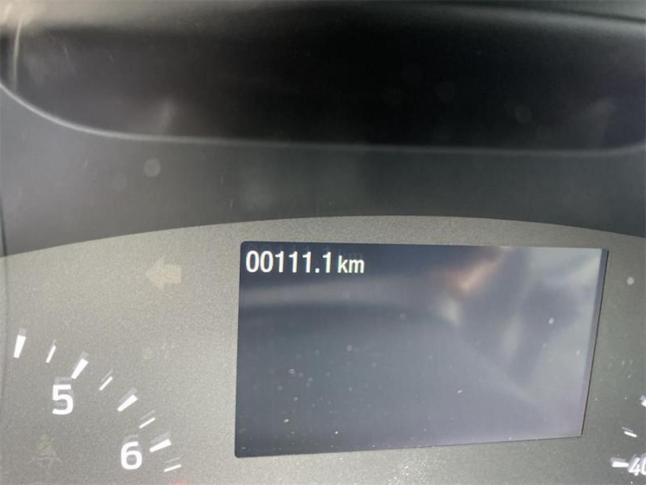 694997