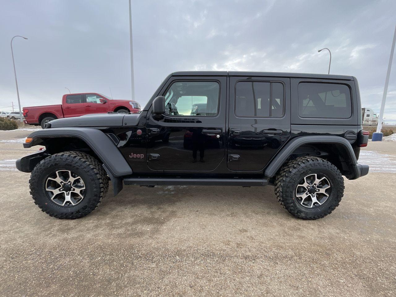 <p>3.0L Diesel! HEATED STEERING WHEEL, HEATED FRONT SEATS, REMOTE START, BLACK FREEDOM HARD TOP 3-PIECE MODULAR HARD TOP, MUD-TERRAIN TIRES, TOW PACKAGE & HD ELECTRIC GROUP, LED LIGHTING GROUP with LED TAIL LAMPS AND HEAD LAMPS, AND MUCH MORE! Here at Sun City Ford, we proudly serve Medicine Hat, Redcliff, Dunmore, Brooks, Lethbridge, Calgary and all of Southern Alberta. No doc fees! The price you see plus GST! Call us toll free at 1-866-223-5723 or email us at sales@suncityford.ca</p>