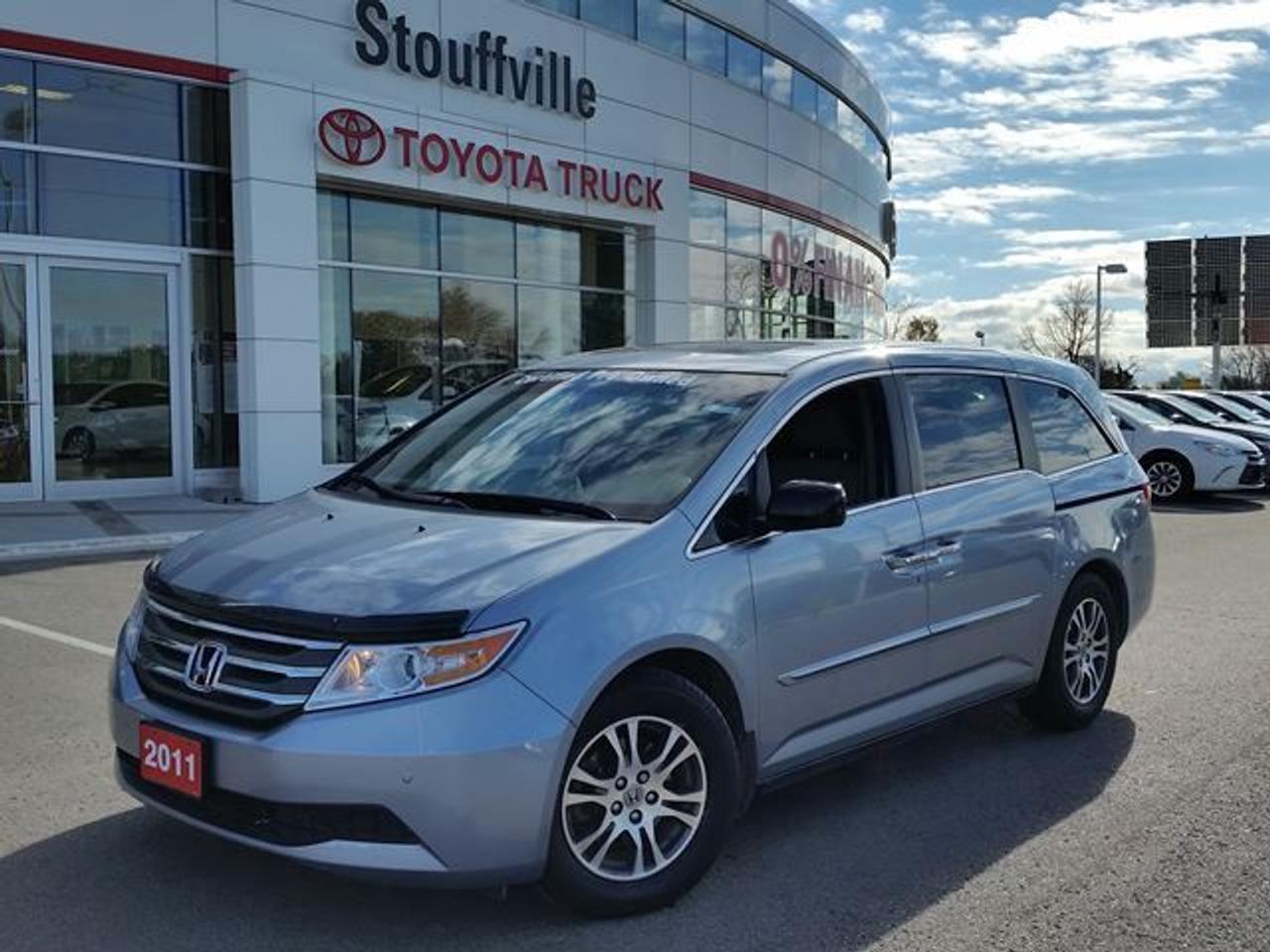 This Celestial Blue 2011 Honda Odyssey is the EX-L Model. This vehicle is ACCIDENT-FREE and is fully Dealer Certified! This Odyssey is nicely equipped with Alloy Rims, Leather Seats, Keyless Entry, Power Windows / Locks / Mirrors and so much more! Recent Reconditioning on this vehicle includes NEW Front Brake Pads and Rotors, NEW Rear Brake Pads and Rotors, and Alignment and a FRESH Oil Change. Call in today for more information to and to book your Road Test Today!