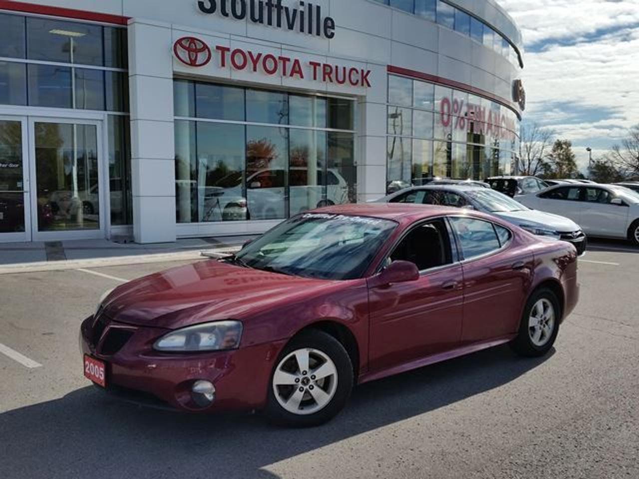 This Sport Red Metallic 2005 Pontiac Grand Prix is the 3.8L V6. This Grand Prix is being offered Fully Dealer Certified! This Grand Prix is equipped with Alloy Rims, Cloth Seats, A/C, Keyless Entry, Fog Lamps and much more. Recent Reconditioning on this vehicle includes NEW Front Brake Pads and Rotors, NEW Rear Brake Pads and Rotors, NEW Emergency Brake Cables and a NEW Engine Air Filter. Call in today for more information and to book your Road Test!
