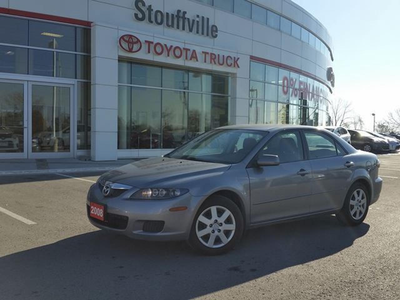 This Tungsten Grey Pearl 2008 Mazda 6 is the 4 Cyl GS model. This vehicle is being offered fully Dealer Certified and E-Tested.  This Mazda 6 is equipped with Keyless Entry, A/C, Steering Wheel Audio Controls, Power Windows / Mirrors / Locks and more! Recent Reconditioning on the vehicle includes a FRESH Oil Change, NEW Wheel Bearing in the Rear, and an Alignment . The Tires are nearly new and have over 85% Tire Life Left and the brake are almost new as well with 90-95% Life Left. Call in for more details and to book your Road Test Today!