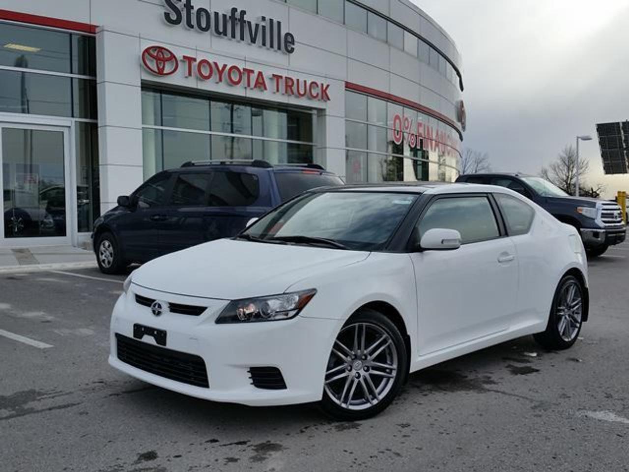 This Alpine White 2011 Scion tC is just in OFF-LEASE and has had only ONE-Previous Owner. This tC is equipped with Alloy rims, Moonroof, Keyless Entry, A/C, power Windows / Locks / Mirrors and much more! This vehicle qualifies for our Toyota Certified Pre-Owned Program. What does that mean? It means this vehicle has been reconditioned to the Highest of Toyotas Standards! Recent Reconditioning includes a FRESH Oil Change, NEW Engine Air Filter, Front Brake Service and a Rear Brake Service. Call in today for more information and to book your Road Test!