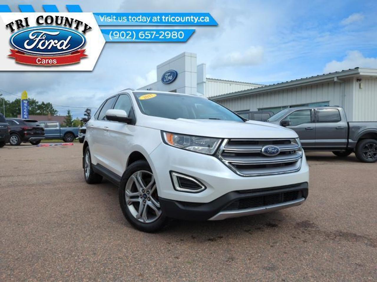 <b>Leather Seats,  Bluetooth,  Heated Seats,  Rear View Camera,  Memory Seats!</b><br> <br>  Compare at $26712 - Our No-Haggle Price is just $25934! <br> <br>   If youre looking for a stylish way to get people and cargo around comfortably and safely, this Edge is worth a serious look. This  2017 Ford Edge is fresh on our lot in Tatamagouche. <br> <br>The Ford Edge can make you unstoppable. It has lots of space for people and cargo and its a genuine pleasure to drive. The craftsmanship and attention to detail inside and out are uncommonly good for a crossover in this price range. Take it for a spin today!This  SUV has 130,815 kms. Its  white in colour  . It has a 6 speed automatic transmission and is powered by a  280HP 3.5L V6 Cylinder Engine.  <br> <br> Our Edges trim level is Titanium. The Titanium trim adds some luxurious features to this Edge. It comes with leather seats which are heated in front, a memory drivers seat, SYNC 3 with  Bluetooth connectivity, SiriusXM, Sony premium audio, a universal garage door opener, LED tail lamps, a foot-activated hands-free power liftgate, a rear view camera, and much more. This vehicle has been upgraded with the following features: Leather Seats,  Bluetooth,  Heated Seats,  Rear View Camera,  Memory Seats,  Premium Sound Package,  Power Tailgate. <br> To view the original window sticker for this vehicle view this <a href=http://www.windowsticker.forddirect.com/windowsticker.pdf?vin=2FMPK4K81HBB53589 target=_blank>http://www.windowsticker.forddirect.com/windowsticker.pdf?vin=2FMPK4K81HBB53589</a>. <br/><br> <br>To apply right now for financing use this link : <a href=https://www.tricounty.ca/finance-department/ target=_blank>https://www.tricounty.ca/finance-department/</a><br><br> <br/><br> Buy this vehicle now for the lowest bi-weekly payment of <b>$254.85</b> with $0 down for 72 months @ 9.49% APR O.A.C. ( taxes included, $389 documentation fee    ).  See dealer for details. <br> <br>Welcome to Tri County Ford Sales, serving customers since 1934! Thank you for visiting us. We carry new and used Ford vehicles as well as other makes and models, and we proudly serve the city of Tatamagouche and the surrounding communities. We look forward to serving you and all your automotive needs here at Tri County Ford Sales! o~o