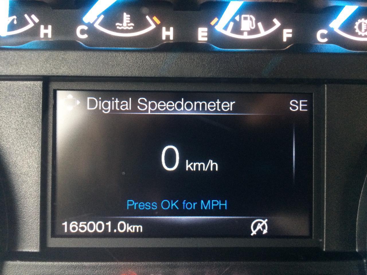 698211