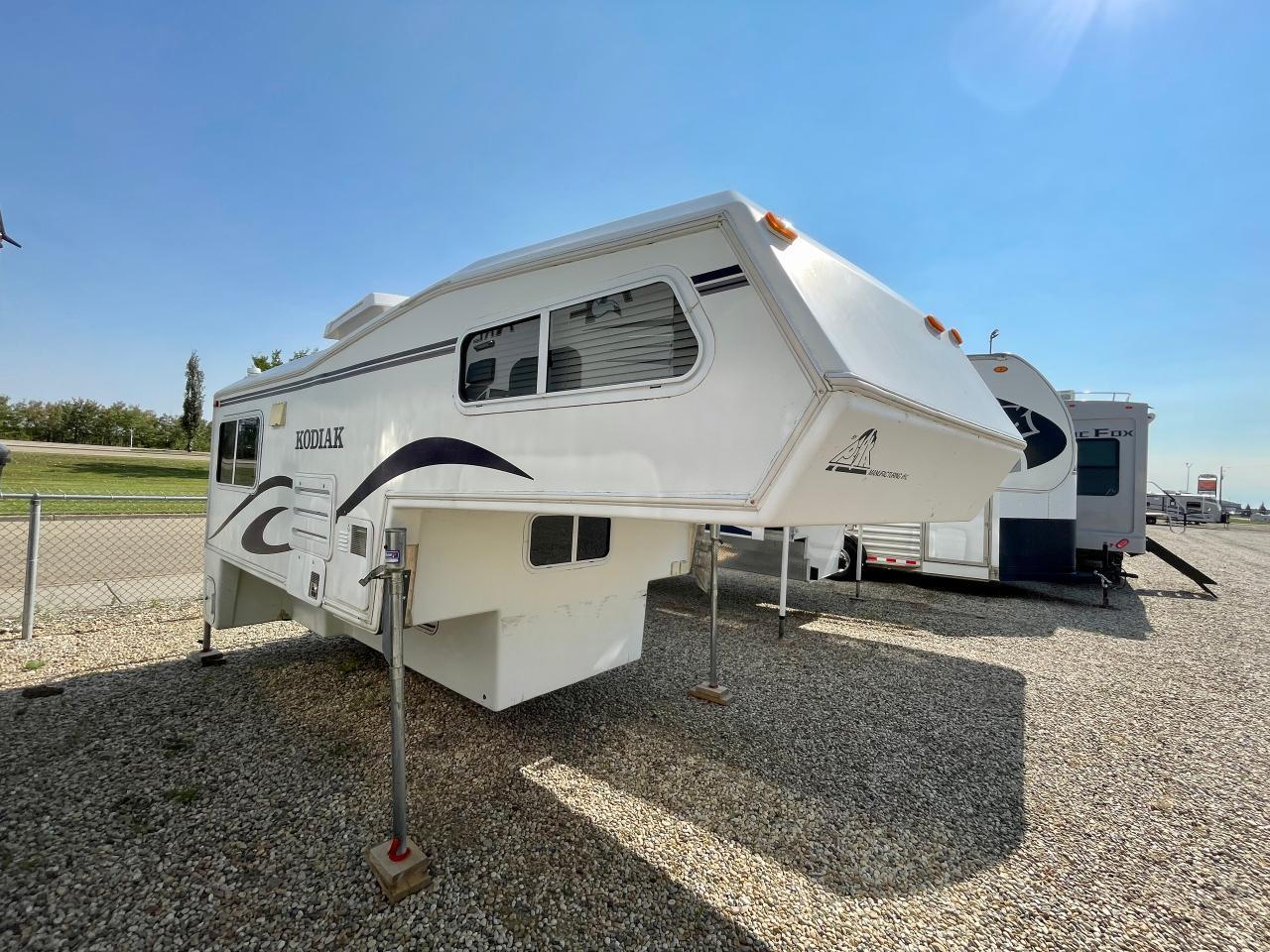 <p>All Fiberglass</p><p>Fantastic Fan</p><p>Manual Camper Jacks</p><p>Range</p><p>Fiberglass Wet Bath</p><p>Refrigerator</p><p>Water Heater</p><p>Large Booth Dinette</p><p>&nbsp;</p>