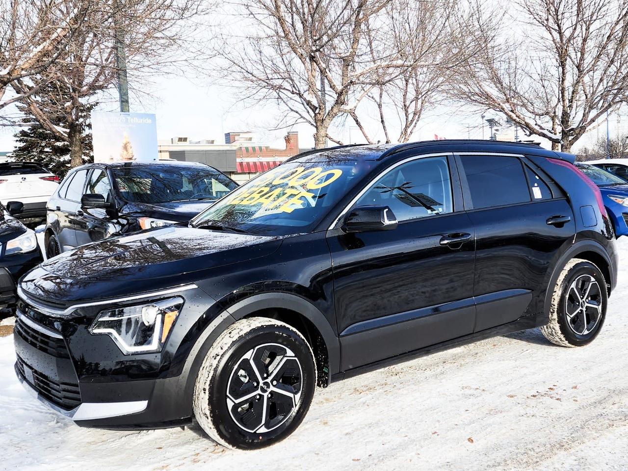 KIA NIRO HEV EX PREMIUM; SUNROOF, REMOTE SMART, PARK ASSIST, KIA CONNECT, ANDROID AUTO, APPLE CARPLAY, QI WIRELESS PHONE CHARGING, SMART KEY, HEATED SEATS/WHEEL, BACKUP CAMERA, POWER LIFT GATE, BLIND-SPOT!!!CALL FOR PRICING!!!The 2025 KIA NIRO HEV EX PREMIUM is very nicely equipped with features and comes with:Technology:10.25 multimedia interface w/ integrated navigationKia ConnectApple CarPlay & Android AutoBluetoothRemote smart parking assistSmart key & push button startRemote engine startInterior:Heated seatsKeyless entryTilt & telescopic steering wheelHigh gloss interior trim60-40 split folding rear seatsSafety:Cruise controlBlind-spot collision avoidance assistRear cross-traffic collision avoidance assistLane follow assist & lane keep assist systemAdvanced highway drive assistRear occupant alertRearview cameraExterior:17 alloy wheelsHalogen bi-function projection headlightsLED positioning lightsLED daytime running lightsLED taillightsFind out today why KIA has been in the top 10 since 2014 in the J.D. Power Initial Quality Study (IQS) for a mass-market automotive brand!!! Were so sure of our vehicles that we offer an industry leading 5-year/100,000 km worry-free comprehensive warranty covering virtually the entire vehicle, and a 5-year/100,000 km Powertrain Warranty covering the engine, transmission, axles, differentials and driveshafts.Go Kia has the right Kia to suit your needs! Our professional sales team speaks your language, literally  we speak several different languages, including Russian, Spanish, Tagalog, Thai, Bangla, Hindi, Urdu, Punjabi, and Korean. We want to help you find the Kia that fits both your lifestyle and budget! Visit or call us today and check out our Google reviews  they tell our story!At Go Kia, were happy to help! Proudly serving Edmonton and all of Alberta including St. Albert, Wetaskiwin, Fort McMurray, Grande Prairie, Drayton Valley, Nisku, Leduc, Rimby, Hinton, St. Paul, Lloydminster, Edson and all of western Canada!Call or text us at (780)-465-3535 or email eiafolla@gokia.caAMVIC Licensed Business.   **Price includes all fees and delivery and destination charge**Special pricing applies to cash purchase only and not applicable for subvented financing, other offers may be available.