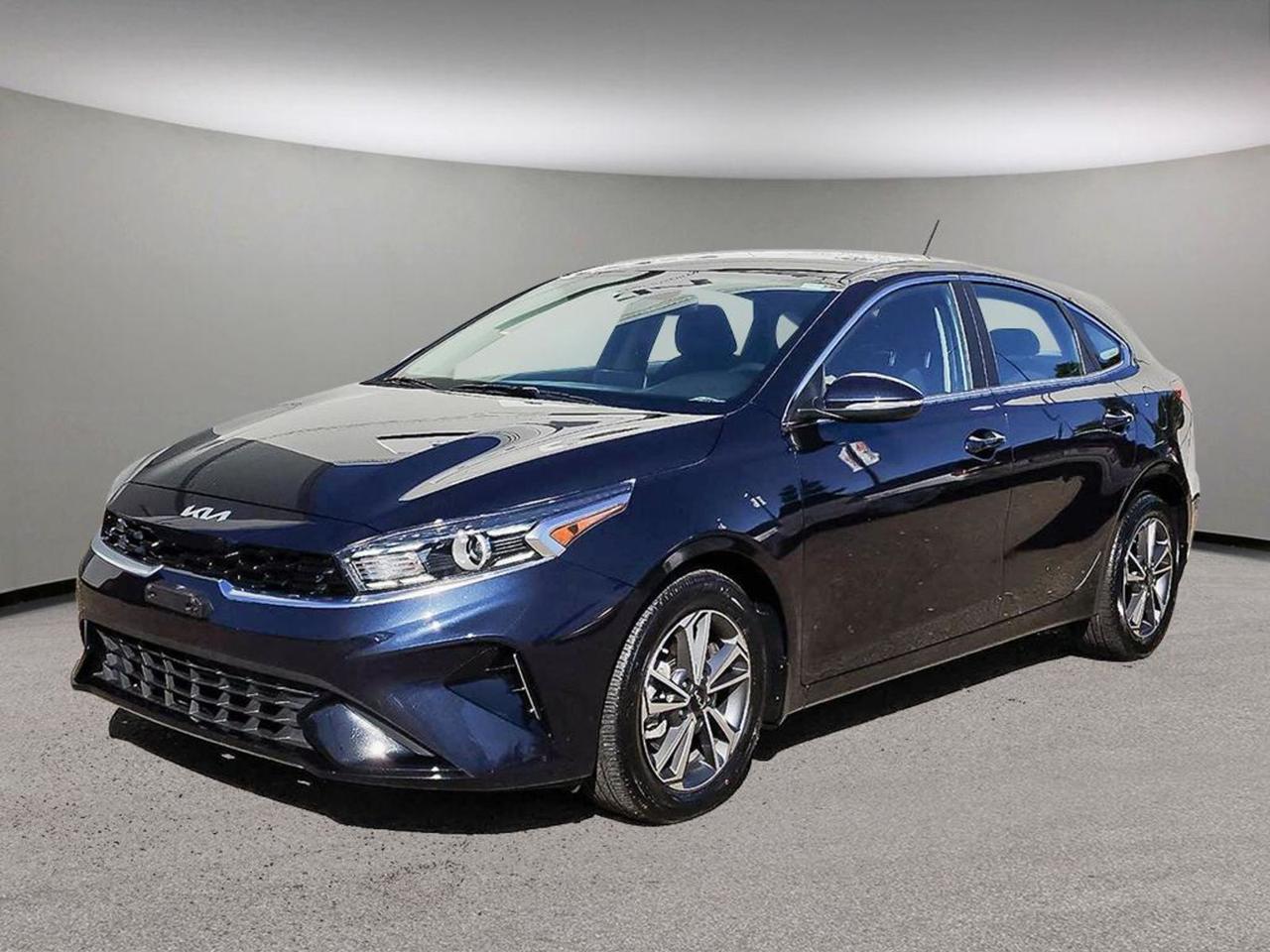 KIA FORTE 5 EX; HEATED SEATS, BACKUP CAMERA, ANDROID AUTO, APPLE CARPLAY, QI WIRLESS CHARGING!!!IN HOUSE FINANCING, IN HOUSE LEASING AVAILABLE O.A.C.This 2023 KIA FORTE 5 EX is very nicely equipped with features and comes with:Technology;Wireless QI charger,8 Touch screen with backup camera,Apple CarPlay and Android Auto,Bluetooth with AM/FM/USB player,Cruise controlRear-view cameraS/W Audio Controls4.2 TFT/LCD ClusterRemote Keyless EntryComfort;Climate control with auto window defog,Power windows/locks/mirrors,Automatic headlights,Leather multi-function steering wheelLeather Shift KnobFront seat Height AdjustersTilt/Telescopic Steering WheelAir Conditioning60/40 Rear Folding SeatsObstacle Detecting DriverWindowCentral Door LockRear Climate VentilationRear Center Armrest with cupholderSatin Chrome Interior DR HandlesIlluminated Vanity MirrorsAUX+USB InputRear USB chargerLuggage NetWinter Comfort;Heated seats,Heated steering wheel,Heated mirrors,Safety;Forward Collision Avoidance (FCA)Blind Spot Detection Warning,Rear cross traffic alert (RCTA),Lane keep assist (LKA),6 airbags,4 Wheel disk brakes with ABS,Electronic stability control (ESC),Hill assist control (HAC),Vehicle immobilizer,Exterior;16 Alloy wheelsLED daytime running lights and positioning lights,LED taillightsHalogen Projection HeadlightsBody Colour side-view mirrorsGloss Black & Chrome CoatedGrilleHeated side-view mirrorsSide-view Mirror Turn SignalsBody Colored Door HandlesFront & Rear Splash guardsSolar glassChrome BeltlineDual Muffler Appearance (fake)Rear SpoilerVisit Go Kia South for the best selection of 2023 Kia Fortes Edmonton has to offer! The Forte has previously been named AJACs Best Small Car in Canada, and with its incredible tech the 2023 Kia Forte is ready to turn heads as easily as it turns corners. Edmonton Kia Forte drivers will love the new UVO Intelligence feature, which lets you use your phone as a remote starter, climate controller, vehicle locator, and much more. Cut the cord with the Fortes wireless phone charger. Drive with peace of mind thanks to Blind Spot Detection and Advanced Forward Collision Avoidance systems. Fun, smooth, and a great bang for your buck, youll love the freedom youll find in the new Kia Forte, Edmonton.Find out today why KIA has been in the top 10 since 2014 in the J.D. Power Initial Quality Study (IQS) for a mass-market automotive brand!!! Were so sure of our vehicles that we offer an industry leading 5-year/100,000 km worry-free comprehensive warranty covering virtually the entire vehicle, and a 5-year/100,000 km Powertrain Warranty covering the engine, transmission, axles, differentials and driveshafts.Go Kia has the right Kia to suit your needs! Our professional sales team speaks your language, literally  we speak several different languages, including Russian, Spanish, Tagalog, Thai, Bangla, Hindi, Urdu, Punjabi, and Korean. We want to help you find the Kia that fits both your lifestyle and budget! Visit or call us today and check out our Google reviews  they tell our story!At Go Kia, were happy to help! Proudly serving Edmonton and all of Alberta including St. Albert, Wetaskiwin, Fort McMurray, Grande Prairie, Drayton Valley, Nisku, Leduc, Rimby, Hinton, St. Paul, Lloydminster, Edson and all of western Canada!Call or text us at (780)-465-3535 or email eiafolla@gokia.caAn AMVIC Licensed Business.   **Price includes all fees and delivery and destination charge**Special pricing applies to cash purchase only and not applicable for subvented financing, other offers may be available.