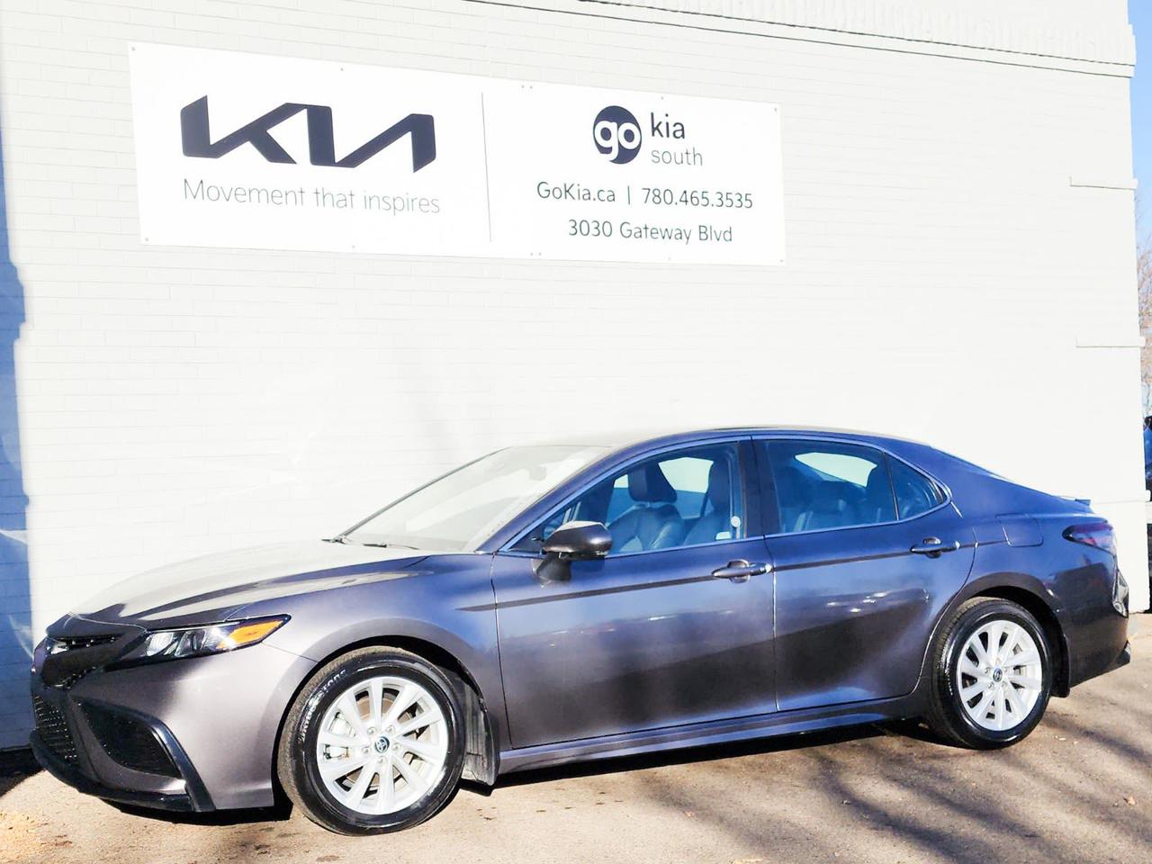 Recent Arrival! Odometer is 2337 kilometers below market average! Gray 2023 Toyota Camry SE FWD 8-Speed Automatic 2.5L 4-Cylinder DOHC 16VHeated Front Seats, 4-Wheel Disc Brakes, 6 Speakers, ABS brakes, Air Conditioning, Alloy wheels, Apple CarPlay/Android Auto, Auto High-beam Headlights, Automatic temperature control, Brake assist, Delay-off headlights, Driver door bin, Driver vanity mirror, Dual front impact airbags, Dual front side impact airbags, Electronic Stability Control, Exterior Parking Camera Rear, Four wheel independent suspension, Front anti-roll bar, Front Bucket Seats, Front reading lights, Fully automatic headlights, Heated door mirrors, Heated Steering Wheel, Illuminated entry, Knee airbag, Low tire pressure warning, Occupant sensing airbag, Outside temperature display, Overhead airbag, Overhead console, Panic alarm, Passenger door bin, Passenger vanity mirror, Power door mirrors, Power driver seat, Power steering, Power windows, Radio data system, Radio: Audio, Rear anti-roll bar, Rear side impact airbag, Rear window defroster, Remote keyless entry, Security system, Speed control, Speed-sensing steering, Split folding rear seat, Spoiler, Steering wheel mounted audio controls, Tachometer, Telescoping steering wheel, Tilt steering wheel, Traction control, Trip computer, Turn signal indicator mirrors, Variably intermittent wipers.IN HOUSE FINANCING, IN HOUSE LEASING AVAILABLE O.A.C.If you are interested and need more information call or message our sales team, we will be glad to help you now!!Our knowledgeable sales staff will help assist you with every step. To book a test drive or receive further information give us a call at (780)-465-3535 or email us: kiahmed@gokia.caAt Go Kia, were happy to help! Proudly serving Edmonton and all of Alberta including St. Albert, Wetaskiwin, Fort McMurray, Grande Prairie, Drayton Valley, Nisku, Leduc, Rimby, Hinton, St. Paul, Lloydminster, Edson, and all of Western Canada!An AMVIC Licensed Business. Value Priced vehicles are aggressively priced and may require some additional mechanical or cosmetic repairs, all disclosed on a Vehicle Assessment Report!This vehicle may be leased or financed by anyone*, however, due to the recent increase in fraudulent vehicle purchase activity, Go Kia reserves the right to decline a transaction on suspicion of non-retail intentions including but not limited to wholesaling or exporting.*on approved credit, see dealer for details
