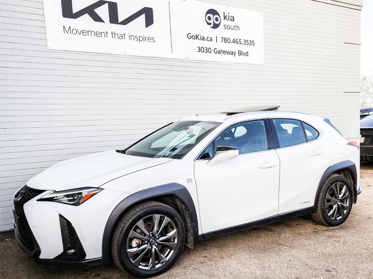 Awards: * ALG Canada Residual Value Awards Recent Arrival! White 2020 Lexus UX 250h Base AWD eCVT 2.0L 4-Cylinder DOHC2.0L 4-Cylinder DOHC, 3-Spoke F SPORT Steering Wheel, 4-Wheel Disc Brakes, ABS brakes, Active Cruise Control, Active Sound Control, Apple CarPlay/Android Auto, Auto High-beam Headlights, Auto-dimming Rear-View mirror, Electronic Stability Control, Emergency communication system: Safety Connect, Exterior Parking Camera Rear, F SPORT Front Grille, F SPORT Heated Front Bucket Seats, F SPORT NuLuxe Seat Surfaces, F SPORT Shift Knob, Fully automatic headlights, Headlight cleaning, Heated & Ventilated Front Bucket Seats, Heated steering wheel, Illuminated entry, Lane Departure Warning System, Leather steering wheel, LED Fog Lamps & Cornering Lamps, Low tire pressure warning, NuLuxe Seat Surfaces, Paddle Shifters, Rain sensing wipers, Telescoping steering wheel, Tilt steering wheel, Traction control, Turn signal indicator mirrors, UX 250h F SPORT Series 1, Ventilated front seats, Wheels: 18 F SPORT Alloy.IN HOUSE FINANCING, IN HOUSE LEASING AVAILABLE O.A.C.WE JUST GOT IT!! PICTURES AND INFO COMING SOON!!!If you are interested and need more information call or message our sales team, we will be glad to help you now!!Our knowledgeable sales staff will help assist you with every step. To book a test drive or receive further information give us a call at (780)-465-3535 or email us: kiahmed@gokia.caAt Go Kia, were happy to help! Proudly serving Edmonton and all of Alberta including St. Albert, Wetaskiwin, Fort McMurray, Grande Prairie, Drayton Valley, Nisku, Leduc, Rimby, Hinton, St. Paul, Lloydminster, Edson, and all of Western Canada!An AMVIC Licensed Business. Value Priced vehicles are aggressively priced and may require some additional mechanical or cosmetic repairs, all disclosed on a Vehicle Assessment Report!This vehicle may be leased or financed by anyone*, however, due to the recent increase in fraudulent vehicle purchase activity, Go Kia reserves the right to decline a transaction on suspicion of non-retail intentions including but not limited to wholesaling or exporting.*on approved credit, see dealer for details
