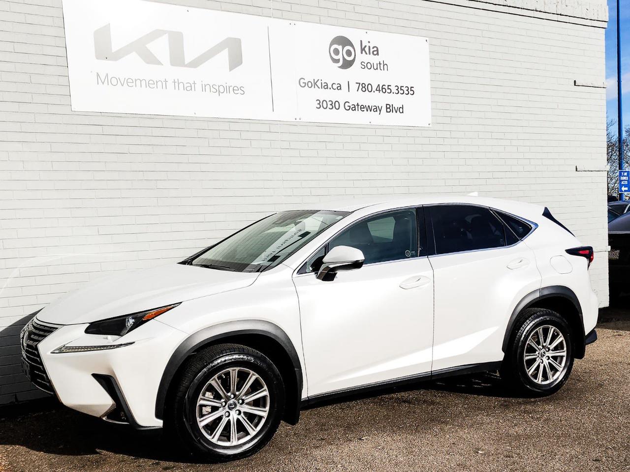 Recent Arrival! Odometer is 5750 kilometers below market average! White 2021 Lexus NX 300 Base AWD 6-Speed Automatic 2.0L I4 Turbocharged DOHC 16V LEV3-ULEV125 235hp4-Wheel Disc Brakes, 8 Speakers, ABS brakes, Air Conditioning, Alloy wheels, AM/FM radio: SiriusXM, Apple CarPlay/Android Auto, Auto High-beam Headlights, Automatic temperature control, Brake assist, CD player, Delay-off headlights, Driver door bin, Driver vanity mirror, Dual front impact airbags, Dual front side impact airbags, Electronic Stability Control, Exterior Parking Camera Rear, Four wheel independent suspension, Front anti-roll bar, Front Bucket Seats, Front dual zone A/C, Front fog lights, Front reading lights, Fully automatic headlights, Heated door mirrors, Illuminated entry, Knee airbag, Leather Shift Knob, Low tire pressure warning, Occupant sensing airbag, Outside temperature display, Overhead airbag, Panic alarm, Passenger door bin, Passenger vanity mirror, Power door mirrors, Power driver seat, Power passenger seat, Power steering, Power windows, Radio data system, Rear anti-roll bar, Rear window defroster, Rear window wiper, Remote keyless entry, Security system, Speed control, Speed-sensing steering, Split folding rear seat, Spoiler, Steering wheel mounted audio controls, Tachometer, Telescoping steering wheel, Tilt steering wheel, Traction control, Trip computer, Turn signal indicator mirrors, Variably intermittent wipers.IN HOUSE FINANCING, IN HOUSE LEASING AVAILABLE O.A.C.If you are interested and need more information call or message our sales team, we will be glad to help you now!!Our knowledgeable sales staff will help assist you with every step. To book a test drive or receive further information give us a call at (780)-465-3535 or email us: kiahmed@gokia.caAt Go Kia, were happy to help! Proudly serving Edmonton and all of Alberta including St. Albert, Wetaskiwin, Fort McMurray, Grande Prairie, Drayton Valley, Nisku, Leduc, Rimby, Hinton, St. Paul, Lloydminster, Edson, and all of Western Canada!An AMVIC Licensed Business. Value Priced vehicles are aggressively priced and may require some additional mechanical or cosmetic repairs, all disclosed on a Vehicle Assessment Report!This vehicle may be leased or financed by anyone*, however, due to the recent increase in fraudulent vehicle purchase activity, Go Kia reserves the right to decline a transaction on suspicion of non-retail intentions including but not limited to wholesaling or exporting.*on approved credit, see dealer for details