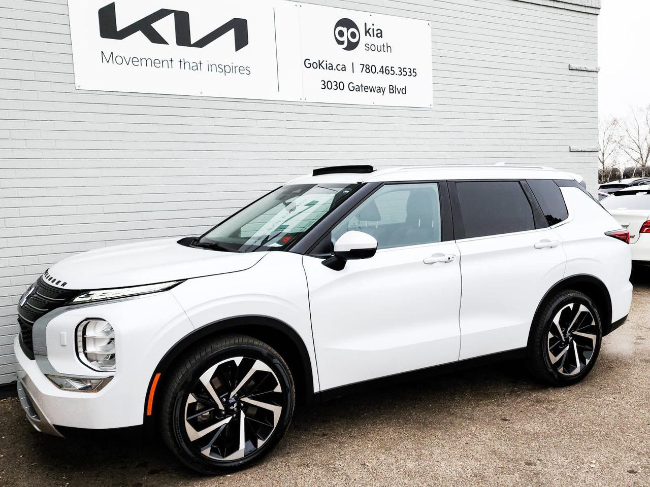 Recent Arrival! Odometer is 28968 kilometers below market average! White 2022 Mitsubishi Outlander LE 4WD CVT 2.5L 4-Cylinder DOHC4WD, 3rd row seats: split-bench, 4-Wheel Disc Brakes, 5.694 Axle Ratio, 6 Speakers, ABS brakes, Active Cruise Control, Air Conditioning, Alloy wheels, AM/FM radio: SiriusXM, Auto High-beam Headlights, Automatic temperature control, Brake assist, Bumpers: body-colour, Driver door bin, Driver vanity mirror, Dual front impact airbags, Dual front side impact airbags, Electronic Stability Control, Emergency communication system: Mitsubishi Connect w/ 24-month trial, Fabric-Appointed Seat Trim, Four wheel independent suspension, Front anti-roll bar, Front Bucket Seats, Front dual zone A/C, Front fog lights, Front reading lights, Fully automatic headlights, Headlight cleaning, Heated door mirrors, Heated Front Bucket Seats, Heated front seats, Heated steering wheel, Illuminated entry, Knee airbag, Leather Shift Knob, Leather steering wheel, Low tire pressure warning, Navigation System, Navigation system: Powered by TOMTOM, Occupant sensing airbag, Outside temperature display, Overhead airbag, Overhead console, Panic alarm, Passenger door bin, Passenger vanity mirror, Power door mirrors, Power Liftgate, Power moonroof, Power steering, Power windows, Radio data system, Radio: 9 Smartphone Link Display Audio, Rear air conditioning, Rear anti-roll bar, Rear Parking Sensors, Rear side impact airbag, Rear window defroster, Rear window wiper, Reclining 3rd row seat, Remote keyless entry, Roof rack: rails only, Security system, Speed control, Speed-Sensitive Wipers, Split folding rear seat, Spoiler, Steering wheel mounted audio controls, Tachometer, Telescoping steering wheel, Tilt steering wheel, Traction control, Trip computer, Turn signal indicator mirrors, Variably intermittent wipers, Wheels: 20 x 8J Two-Tone Alloy.IN HOUSE FINANCING, IN HOUSE LEASING AVAILABLE O.A.C.If you are interested and need more information call or message our sales team, we will be glad to help you now!!Our knowledgeable sales staff will help assist you with every step. To book a test drive or receive further information give us a call at (780)-465-3535 or email us: kiahmed@gokia.caAt Go Kia, were happy to help! Proudly serving Edmonton and all of Alberta including St. Albert, Wetaskiwin, Fort McMurray, Grande Prairie, Drayton Valley, Nisku, Leduc, Rimby, Hinton, St. Paul, Lloydminster, Edson, and all of Western Canada!An AMVIC Licensed Business. Value Priced vehicles are aggressively priced and may require some additional mechanical or cosmetic repairs, all disclosed on a Vehicle Assessment Report!This vehicle may be leased or financed by anyone*, however, due to the recent increase in fraudulent vehicle purchase activity, Go Kia reserves the right to decline a transaction on suspicion of non-retail intentions including but not limited to wholesaling or exporting.*on approved credit, see dealer for details