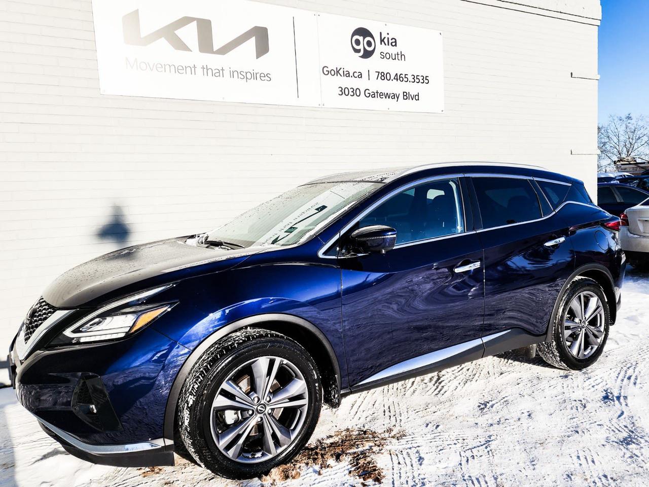 Recent Arrival! Odometer is 12348 kilometers below market average! Blue 2023 Nissan Murano Platinum AWD CVT with Xtronic 3.5L 6-Cylinder DOHC 24VCVT with Xtronic, AWD, 11 Speakers, 4.677 Axle Ratio, 4-Wheel Disc Brakes, ABS brakes, Air Conditioning, Alloy wheels, AM/FM radio: SiriusXM, Auto High-beam Headlights, Auto tilt-away steering wheel, Auto-dimming Rear-View mirror, Automatic temperature control, Blind Spot Warning, Brake assist, Bumpers: body-colour, CD player, Child-Seat-Sensing Airbag, Climate-Controlled Front Bucket Seats, Compass, Delay-off headlights, Driver door bin, Driver vanity mirror, Dual front impact airbags, Dual front side impact airbags, Electronic Stability Control, Emergency communication system: NissanConnect Services w/6 month free trial, Exterior Parking Camera Rear, Four wheel independent suspension, Front anti-roll bar, Front Bucket Seats, Front dual zone A/C, Front fog lights, Front reading lights, Full Tank of Fuel & Floor Mats, Fully automatic headlights, Garage door transmitter: HomeLink, Heated door mirrors, Heated front seats, Heated rear seats, Heated steering wheel, Illuminated entry, Knee airbag, Leather steering wheel, Low tire pressure warning, Memory seat, Navigation system: NissanConnect Navigation, NissanConnect featuring Apple CarPlay and Android Auto, Occupant sensing airbag, Outside temperature display, Overhead airbag, Overhead console, Panic alarm, Passenger door bin, Passenger vanity mirror, Power door mirrors, Power driver seat, Power Liftgate, Power moonroof, Power passenger seat, Power steering, Power windows, Radio data system, Radio: Bose Premium Audio System w/Navigation, Rear anti-roll bar, Rear reading lights, Rear side impact airbag, Rear window defroster, Rear window wiper, Remote keyless entry, Roof rack: rails only, Security system, Semi-Aniline Leather-Appointed Seat Trim, Speed control, Speed-sensing steering, Speed-Sensitive Wipers, Split folding rear seat, Spoiler, Steering wheel memory, Steering wheel mounted audio controls, Tachometer, Telescoping steering wheel, Tilt steering wheel, Traction control, Trip computer, Turn signal indicator mirrors, Variably intermittent wipers, Ventilated front seats, Wheels: 20 Unique Dark Hyper Silver.IN HOUSE FINANCING, IN HOUSE LEASING AVAILABLE O.A.C.If you are interested and need more information call or message our sales team, we will be glad to help you now!!Our knowledgeable sales staff will help assist you with every step. To book a test drive or receive further information give us a call at (780)-465-3535 or email us: kiahmed@gokia.caAt Go Kia, were happy to help! Proudly serving Edmonton and all of Alberta including St. Albert, Wetaskiwin, Fort McMurray, Grande Prairie, Drayton Valley, Nisku, Leduc, Rimby, Hinton, St. Paul, Lloydminster, Edson, and all of Western Canada!An AMVIC Licensed Business. Value Priced vehicles are aggressively priced and may require some additional mechanical or cosmetic repairs, all disclosed on a Vehicle Assessment Report!This vehicle may be leased or financed by anyone*, however, due to the recent increase in fraudulent vehicle purchase activity, Go Kia reserves the right to decline a transaction on suspicion of non-retail intentions including but not limited to wholesaling or exporting.*on approved credit, see dealer for details