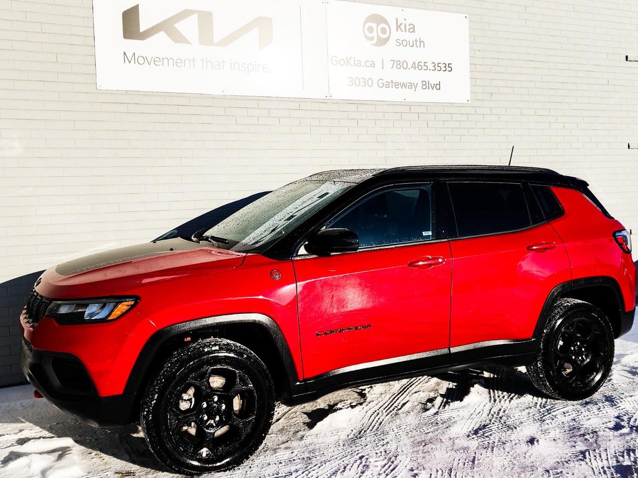 Recent Arrival! Red 2024 Jeep Compass Trailhawk 4WD 8-Speed Automatic 2.0L I4 DOHC4WD, 10.1 Touchscreen Display, 10.25 Colour Display, 4.398 Final Drive Ratio, 4G LTE Wi-Fi Hot Spot, 4-Wheel Disc Brakes, 6 Speakers, 6-Month SiriusXM Radio Service, ABS brakes, Air Conditioning, Alexa Built-In, Alloy wheels, AM/FM radio: SiriusXM with 360L, Anti-whiplash front head restraints, Apple CarPlay/Android Auto, Auto High-beam Headlights, Auto-dimming Rear-View mirror, Automatic temperature control, Brake assist, Bumpers: body-colour, Connected Travel & Traffic Services, Delay-off headlights, Disassociated Touchscreen Display, Driver door bin, Driver vanity mirror, Dual front impact airbags, Dual front side impact airbags, Dual-Pane Panoramic Sunroof, Electronic Stability Control, Emergency communication system: Jeep Connect, For Details, Visit DriveUconnect.com, For SiriusXM Info, Call 888-539-7474, Four wheel independent suspension, Front anti-roll bar, Front Bucket Seats, Front dual zone A/C, Front fog lights, Front reading lights, Fully automatic headlights, Garage door transmitter, Global Telematics Box Module (TBM), GPS Navigation, Hands-Free Phone Communication, HD Radio, Heated door mirrors, Heated front seats, Heated steering wheel, Illuminated entry, Knee airbag, Leather Shift Knob, Low tire pressure warning, Occupant sensing airbag, Outside temperature display, Overhead airbag, Overhead console, Panic alarm, ParkView Rear Back-Up Camera, Passenger door bin, Passenger vanity mirror, Power door mirrors, Power driver seat, Power Liftgate, Power steering, Power windows, Premium Alpine Speaker System, Premium Cloth/Leather-Faced Bucket Seats, Quick Order Package 29E Trailhawk, Radio: Uconnect 5 Nav w/10.1 Display, Radio: Uconnect 5 w/10.1 Display, Rain sensing wipers, Rear anti-roll bar, Rear window defroster, Rear window wiper, Remote keyless entry, Roof rack: rails only, Security system, SiriusXM Guardian-Included Trial, SiriusXM w/360L On-Demand Content, Speed control, Split folding rear seat, Spoiler, Steering wheel mounted audio controls, Sun Sound & Navigation Package, Tachometer, Telescoping steering wheel, Tilt steering wheel, Traction control, Turn signal indicator mirrors, Variably intermittent wipers, Wheels: 17 x 6.5 Black Aluminum, Wheels: 17 x 6.5 Painted Black Aluminum (DISC).IN HOUSE FINANCING, IN HOUSE LEASING AVAILABLE O.A.C.If you are interested and need more information call or message our sales team, we will be glad to help you now!!Our knowledgeable sales staff will help assist you with every step. To book a test drive or receive further information give us a call at (780)-465-3535 or email us: kiahmed@gokia.caAt Go Kia, were happy to help! Proudly serving Edmonton and all of Alberta including St. Albert, Wetaskiwin, Fort McMurray, Grande Prairie, Drayton Valley, Nisku, Leduc, Rimby, Hinton, St. Paul, Lloydminster, Edson, and all of Western Canada!An AMVIC Licensed Business. Value Priced vehicles are aggressively priced and may require some additional mechanical or cosmetic repairs, all disclosed on a Vehicle Assessment Report!This vehicle may be leased or financed by anyone*, however, due to the recent increase in fraudulent vehicle purchase activity, Go Kia reserves the right to decline a transaction on suspicion of non-retail intentions including but not limited to wholesaling or exporting.*on approved credit, see dealer for details