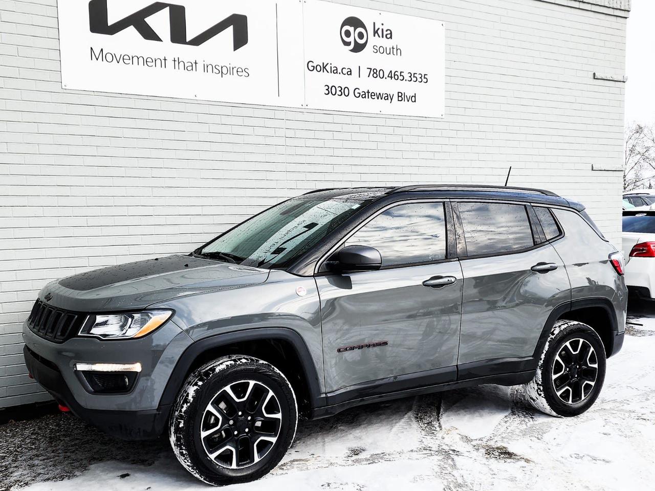 Red 2024 Jeep Compass Trailhawk 4WD 8-Speed Automatic 2.0L I4 DOHC4WD, 10.1 Touchscreen Display, 10.25 Colour Display, 4.398 Final Drive Ratio, 4G LTE Wi-Fi Hot Spot, 4-Wheel Disc Brakes, 6 Speakers, 6-Month SiriusXM Radio Service, ABS brakes, Air Conditioning, Alexa Built-In, Alloy wheels, AM/FM radio: SiriusXM with 360L, Anti-whiplash front head restraints, Apple CarPlay/Android Auto, Auto High-beam Headlights, Auto-dimming Rear-View mirror, Automatic temperature control, Brake assist, Bumpers: body-colour, Connected Travel & Traffic Services, Delay-off headlights, Disassociated Touchscreen Display, Driver door bin, Driver vanity mirror, Dual front impact airbags, Dual front side impact airbags, Dual-Pane Panoramic Sunroof, Electronic Stability Control, Emergency communication system: Jeep Connect, For Details, Visit DriveUconnect.com, For SiriusXM Info, Call 888-539-7474, Four wheel independent suspension, Front anti-roll bar, Front Bucket Seats, Front dual zone A/C, Front fog lights, Front reading lights, Fully automatic headlights, Garage door transmitter, Global Telematics Box Module (TBM), GPS Navigation, Hands-Free Phone Communication, HD Radio, Heated door mirrors, Heated front seats, Heated steering wheel, Illuminated entry, Knee airbag, Leather Shift Knob, Low tire pressure warning, Occupant sensing airbag, Outside temperature display, Overhead airbag, Overhead console, Panic alarm, ParkView Rear Back-Up Camera, Passenger door bin, Passenger vanity mirror, Power door mirrors, Power driver seat, Power Liftgate, Power steering, Power windows, Premium Alpine Speaker System, Premium Cloth/Leather-Faced Bucket Seats, Quick Order Package 29E Trailhawk, Radio: Uconnect 5 Nav w/10.1 Display, Radio: Uconnect 5 w/10.1 Display, Rain sensing wipers, Rear anti-roll bar, Rear window defroster, Rear window wiper, Remote keyless entry, Roof rack: rails only, Security system, SiriusXM Guardian-Included Trial, SiriusXM w/360L On-Demand Content, Speed control, Split folding rear seat, Spoiler, Steering wheel mounted audio controls, Sun Sound & Navigation Package, Tachometer, Telescoping steering wheel, Tilt steering wheel, Traction control, Turn signal indicator mirrors, Variably intermittent wipers, Wheels: 17 x 6.5 Black Aluminum, Wheels: 17 x 6.5 Painted Black Aluminum (DISC).IN HOUSE FINANCING, IN HOUSE LEASING AVAILABLE O.A.C.If you are interested and need more information call or message our sales team, we will be glad to help you now!!Our knowledgeable sales staff will help assist you with every step. To book a test drive or receive further information give us a call at (780)-465-3535 or email us: kiahmed@gokia.caAt Go Kia, were happy to help! Proudly serving Edmonton and all of Alberta including St. Albert, Wetaskiwin, Fort McMurray, Grande Prairie, Drayton Valley, Nisku, Leduc, Rimby, Hinton, St. Paul, Lloydminster, Edson, and all of Western Canada!An AMVIC Licensed Business. Value Priced vehicles are aggressively priced and may require some additional mechanical or cosmetic repairs, all disclosed on a Vehicle Assessment Report!This vehicle may be leased or financed by anyone*, however, due to the recent increase in fraudulent vehicle purchase activity, Go Kia reserves the right to decline a transaction on suspicion of non-retail intentions including but not limited to wholesaling or exporting.*on approved credit, see dealer for details