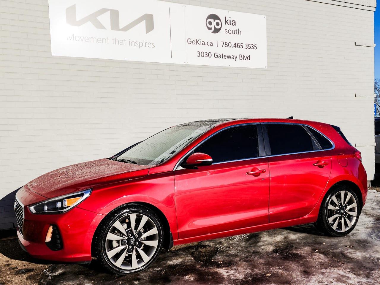 Recent Arrival! Scarlet Red Pearl 2018 Hyundai Elantra GT Sport FWD 1.6L Turbo GDI 4-Cylinder18 x 7.5J Alloy Wheels, 4-Wheel Disc Brakes, ABS brakes, Air Conditioning, Alloy wheels, AM/FM radio: SiriusXM, AppLink/Apple CarPlay and Android Auto, Automatic temperature control, Brake assist, Bumpers: body-colour, Delay-off headlights, Driver door bin, Driver vanity mirror, Dual front impact airbags, Dual front side impact airbags, Electronic Stability Control, Exterior Parking Camera Rear, Four wheel independent suspension, Front anti-roll bar, Front Bucket Seats, Front dual zone A/C, Front reading lights, Fully automatic headlights, Heated door mirrors, Heated front seats, Heated steering wheel, Illuminated entry, Knee airbag, Leather Seating Surfaces, Leather Shift Knob, Leather steering wheel, Occupant sensing airbag, Outside temperature display, Overhead airbag, Overhead console, Panic alarm, Passenger door bin, Passenger vanity mirror, Power door mirrors, Power driver seat, Power moonroof, Power steering, Power windows, Rear anti-roll bar, Rear reading lights, Rear window defroster, Rear window wiper, Remote keyless entry, Security system, Speed control, Speed-sensing steering, Split folding rear seat, Spoiler, Sport steering wheel, Steering wheel mounted audio controls, Tachometer, Telescoping steering wheel, Tilt steering wheel, Traction control, Trip computer, Turn signal indicator mirrors, Variably intermittent wipers.IN HOUSE FINANCING, IN HOUSE LEASING AVAILABLE O.A.C.If you are interested and need more information call or message our sales team, we will be glad to help you now!!Our knowledgeable sales staff will help assist you with every step. To book a test drive or receive further information give us a call at (780)-465-3535 or email us: kiahmed@gokia.caAt Go Kia, were happy to help! Proudly serving Edmonton and all of Alberta including St. Albert, Wetaskiwin, Fort McMurray, Grande Prairie, Drayton Valley, Nisku, Leduc, Rimby, Hinton, St. Paul, Lloydminster, Edson, and all of Western Canada!An AMVIC Licensed Business. Value Priced vehicles are aggressively priced and may require some additional mechanical or cosmetic repairs, all disclosed on a Vehicle Assessment Report!This vehicle may be leased or financed by anyone*, however, due to the recent increase in fraudulent vehicle purchase activity, Go Kia reserves the right to decline a transaction on suspicion of non-retail intentions including but not limited to wholesaling or exporting.*on approved credit, see dealer for details