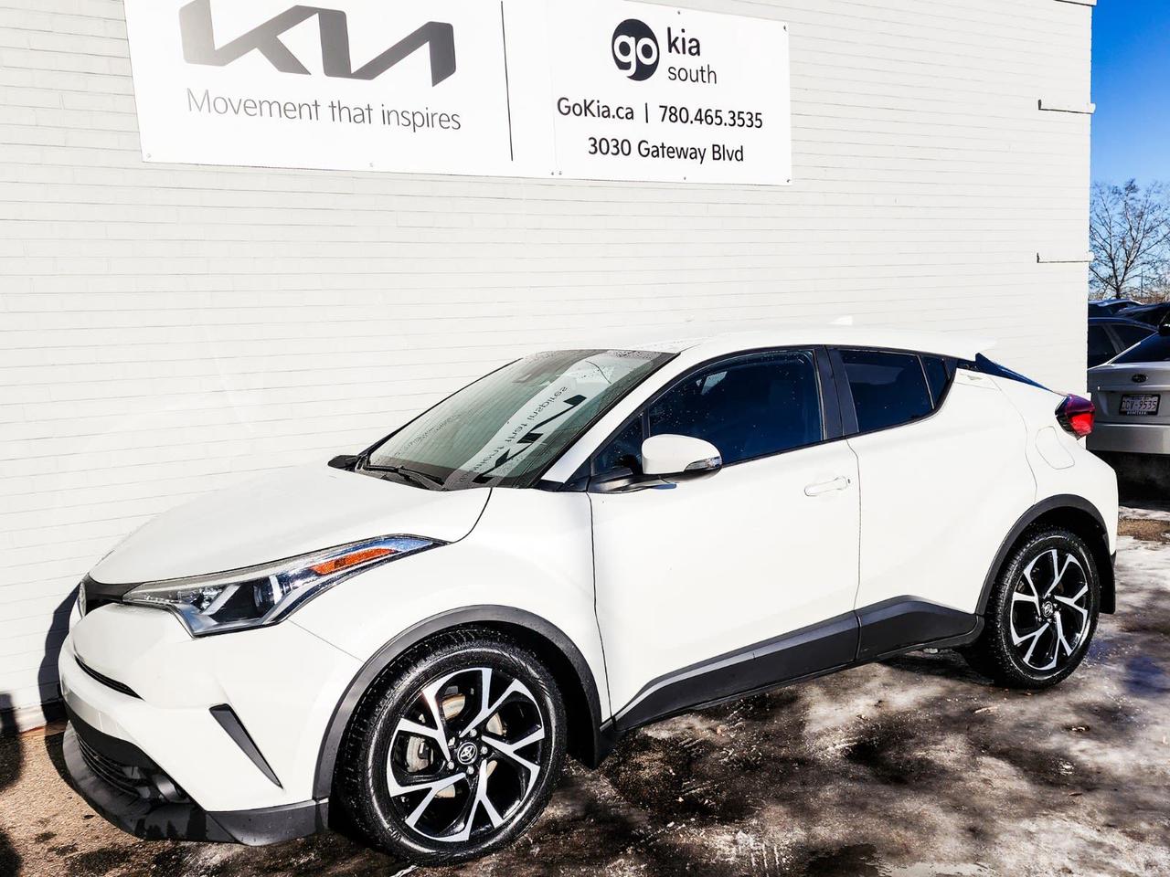 Recent Arrival! White 2018 Toyota C-HR XLE FWD CVT 2.0L I4 DOHC 16V17 Aluminum Alloy Wheels, 4-Wheel Disc Brakes, 6 Speakers, ABS brakes, Air Conditioning, Alloy wheels, AM/FM radio, Auto High-beam Headlights, Auto-dimming Rear-View mirror, Automatic temperature control, Axle Ratio: TBA, Brake assist, Bumpers: body-colour, Delay-off headlights, Driver door bin, Driver vanity mirror, Dual front impact airbags, Dual front side impact airbags, Electronic Stability Control, Exterior Parking Camera Rear, Fabric Seat Material, Four wheel independent suspension, Front anti-roll bar, Front Bucket Seats, Front dual zone A/C, Front reading lights, Fully automatic headlights, Heated door mirrors, Heated front seats, Heated Sport Front Bucket Seats, Illuminated entry, Knee airbag, Leather Shift Knob, Low tire pressure warning, Occupant sensing airbag, Outside temperature display, Overhead airbag, Panic alarm, Passenger door bin, Passenger vanity mirror, Power door mirrors, Power steering, Power windows, Radio data system, Radio: AM/FM Stereo w/7 Display Screen, Rear anti-roll bar, Rear side impact airbag, Rear window defroster, Rear window wiper, Remote keyless entry, Speed control, Speed-sensing steering, Split folding rear seat, Spoiler, Steering wheel mounted audio controls, Tachometer, Telescoping steering wheel, Tilt steering wheel, Traction control, Trip computer, Turn signal indicator mirrors, Variably intermittent wipers.Reviews: * The Toyota C-HR seems to have impressed owners with its nicely balanced ride and handling equation, with some owners noting the machine handles and rides well. Quick steering and sporty looks draw praise from driving enthusiasts, and fuel economy seems well-rated, too. Source: autoTRADER.caIN HOUSE FINANCING, IN HOUSE LEASING AVAILABLE O.A.C.If you are interested and need more information call or message our sales team, we will be glad to help you now!!Our knowledgeable sales staff will help assist you with every step. To book a test drive or receive further information give us a call at (780)-465-3535 or email us: kiahmed@gokia.caAt Go Kia, were happy to help! Proudly serving Edmonton and all of Alberta including St. Albert, Wetaskiwin, Fort McMurray, Grande Prairie, Drayton Valley, Nisku, Leduc, Rimby, Hinton, St. Paul, Lloydminster, Edson, and all of Western Canada!An AMVIC Licensed Business. Value Priced vehicles are aggressively priced and may require some additional mechanical or cosmetic repairs, all disclosed on a Vehicle Assessment Report!This vehicle may be leased or financed by anyone*, however, due to the recent increase in fraudulent vehicle purchase activity, Go Kia reserves the right to decline a transaction on suspicion of non-retail intentions including but not limited to wholesaling or exporting.*on approved credit, see dealer for details