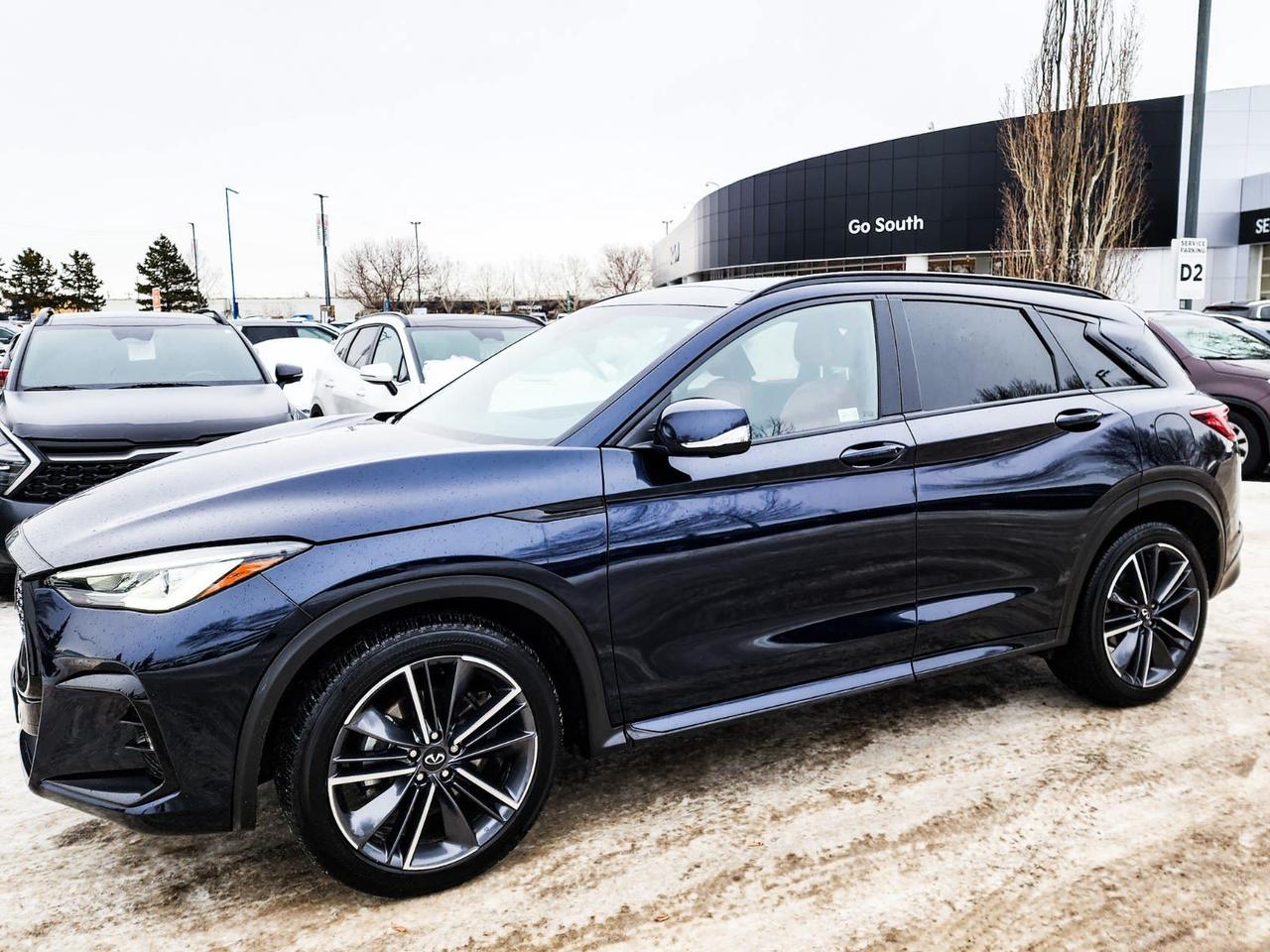 Recent Arrival! Blue 2023 INFINITI QX50 SPORT AWD CVT 2.0L I4 PDI Turbocharged DOHC 16V LEV3-ULEV50 268hp12 Speakers, 4-Wheel Disc Brakes, 5.85 Axle Ratio, ABS brakes, Air Conditioning, Alloy wheels, AM/FM radio: SiriusXM, Anti-whiplash front head restraints, Auto High-beam Headlights, Auto-dimming Rear-View mirror, Automatic temperature control, Brake assist, Bumpers: body-colour, CD player, Climate Controlled Front Bucket Seats, Delay-off headlights, Driver door bin, Driver vanity mirror, Dual front impact airbags, Dual front side impact airbags, Electronic Stability Control, Emergency communication system: INFINITI InTouch, Four wheel independent suspension, Front anti-roll bar, Front Bucket Seats, Front dual zone A/C, Front fog lights, Front reading lights, Full Tank of Fuel & Floor Mats, Garage door transmitter: HomeLink, Heated door mirrors, Heated front seats, Heated steering wheel, Illuminated entry, Knee airbag, Leather Shift Knob, Leather steering wheel, Low tire pressure warning, Memory seat, Navigation system: INFINITI InTouch Navigation, Occupant sensing airbag, Outside temperature display, Overhead airbag, Overhead console, Panic alarm, Passenger door bin, Passenger vanity mirror, Power door mirrors, Power driver seat, Power Liftgate, Power moonroof, Power passenger seat, Power steering, Power windows, Radio data system, Radio: INFINITI InTouch Navi Dual Display System, Rain sensing wipers, Rear anti-roll bar, Rear reading lights, Rear side impact airbag, Rear window defroster, Rear window wiper, Remote keyless entry, Security system, Semi-Aniline Leather-Appointed Seating Surfaces, Speed control, Speed-sensing steering, Speed-Sensitive Wipers, Split folding rear seat, Spoiler, Steering wheel mounted audio controls, Tachometer, Telescoping steering wheel, Tilt steering wheel, Traction control, Trip computer, Turn signal indicator mirrors, Variably intermittent wipers, Ventilated front seats, Wheels: 20 Dark Painted & Machine Finished.IN HOUSE FINANCING, IN HOUSE LEASING AVAILABLE O.A.C.If you are interested and need more information call or message our sales team, we will be glad to help you now!!Our knowledgeable sales staff will help assist you with every step. To book a test drive or receive further information give us a call at (780)-465-3535 or email us: kiahmed@gokia.caAt Go Kia, were happy to help! Proudly serving Edmonton and all of Alberta including St. Albert, Wetaskiwin, Fort McMurray, Grande Prairie, Drayton Valley, Nisku, Leduc, Rimby, Hinton, St. Paul, Lloydminster, Edson, and all of Western Canada!An AMVIC Licensed Business. Value Priced vehicles are aggressively priced and may require some additional mechanical or cosmetic repairs, all disclosed on a Vehicle Assessment Report!This vehicle may be leased or financed by anyone*, however, due to the recent increase in fraudulent vehicle purchase activity, Go Kia reserves the right to decline a transaction on suspicion of non-retail intentions including but not limited to wholesaling or exporting.*on approved credit, see dealer for details