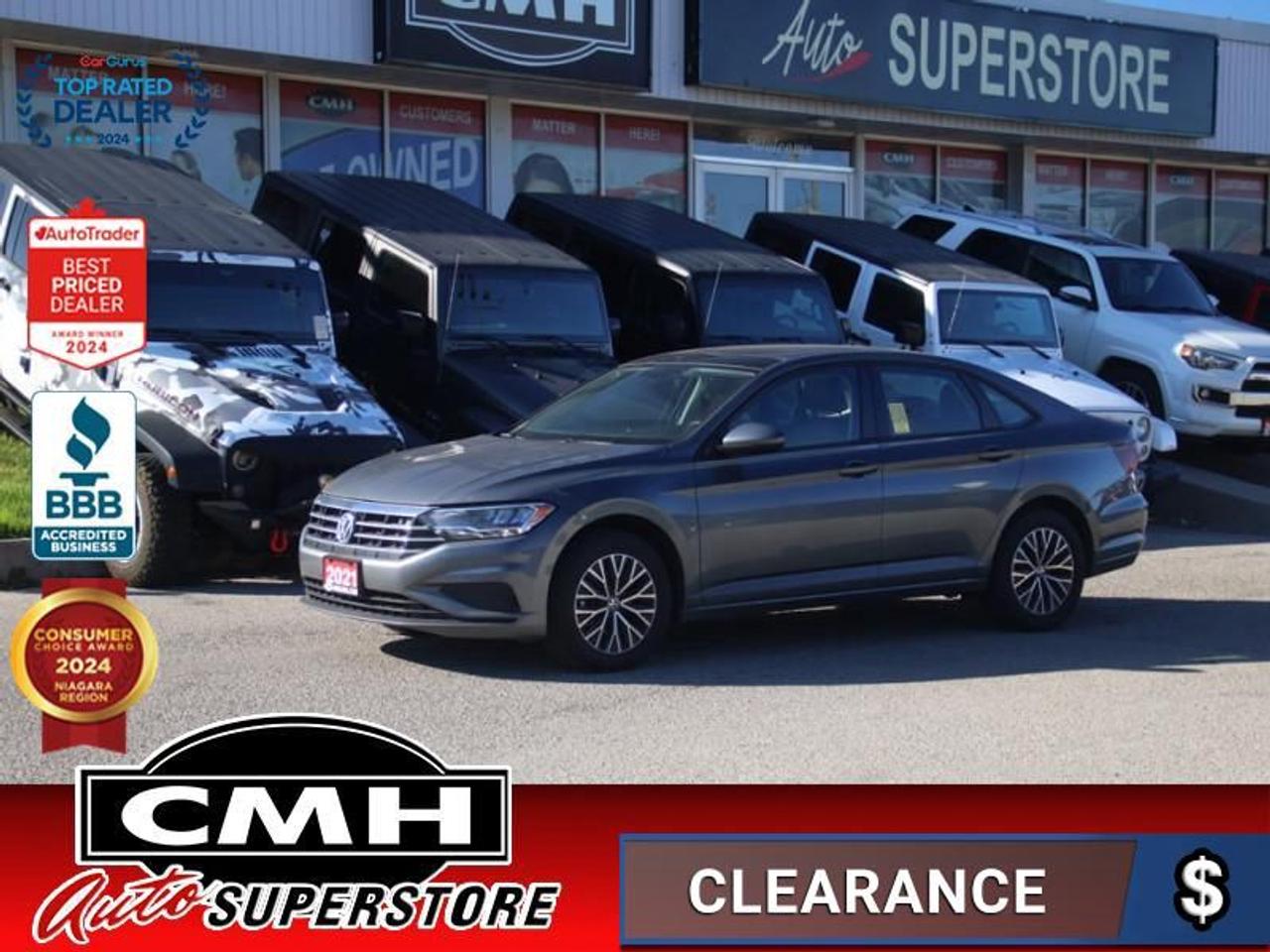 <b>GREAT VALUE !! REAR CAMERA, CROSS TRAFFIC ALERT, BLIND SPOT, APPLE CARPLAY, ANDROID AUTO, BLUETOOTH, STEERING WHEEL CONTROLS, SUNROOF, LEATHER, HEATED SEATS, DUAL CLIMATE CONTROL, BUTTON START, PROXIMITY KEY, 16-INCH ALLOY WHEELS</b><br>  <br>CMH certifies that all vehicles meet DOUBLE the Ministry standards for Brakes and Tires<br><br> <br>    This  2021 Volkswagen Jetta is for sale today. <br> <br>Redesigned. Not over designed. Rather than adding needless flash, the Jetta has been redesigned for a tasteful, more premium look and feel. One quick glance is all it takes to appreciate the result. Its sporty. Its sleek. It makes a statement without screaming. The overall effect stands out anywhere. Its roomy and well finished interior provides the best of comforts and will help keep this elegant sedan ageless and beautiful for many years to come.This  sedan has 83,026 kms. Its  platinum gray metallic in colour  and is major accident free based on the <a href=https://vhr.carfax.ca/?id=TNa/4G3hipyop3j0N2luh0iK5hFO3EQc target=_blank>CARFAX Report</a> . It has an automatic transmission and is powered by a  147HP 1.4L 4 Cylinder Engine. <br> <br> Our Jettas trim level is Highline. Upgrade to this Jetta Highline and youll get features like these aluminum wheels, a large Rail2Rail power sunroof, leatherette heated seats and a heated-leather wrapped steering wheel, fully automatic LED headlamps, a larger 8 inch touchscreen infotainment system with  satellite navigation, Android Auto and Apple CarPlay, blind spot monitor with rear traffic alert, cruise control, a proximity key with remote keyless entry, a rear view camera and much more. This vehicle has been upgraded with the following features: Navigation,  Sunroof,  Blind Spot Detection,  Heated Seats,  Heated Steering Wheel,  Led Headlights,  Android Auto. <br> <br>To apply right now for financing use this link : <a href=https://www.cmhniagara.com/financing/ target=_blank>https://www.cmhniagara.com/financing/</a><br><br> <br/><br>Trade-ins are welcome! Financing available OAC ! Price INCLUDES a valid safety certificate! Price INCLUDES a 60-day limited warranty on all vehicles except classic or vintage cars. CMH is a Full Disclosure dealer with no hidden fees. We are a family-owned and operated business for over 30 years! o~o