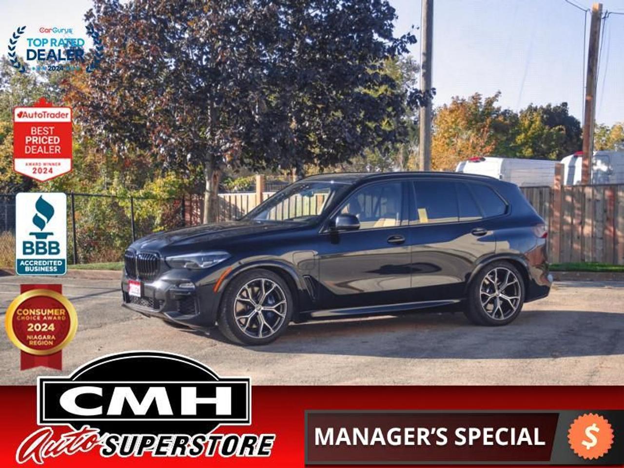 <b>PREMIUM EXCELLENCE PACKAGE !! M SPORT PACKAGE !! PLUG IN HYBRID !! NAVIGATION, REAR CAMERA, BLIND SPOT, COLLISION SENSORS, LANE KEEPING, ADAPTIVE CRUISE, PANORAMIC SUNROOF, LEATHER, HEATED SEATS/STEERING WHEEL, POWER LIFTGATE, HEATED/COOLED CUP HOLDERS</b><br>  <br>CMH certifies that all vehicles meet DOUBLE the Ministry standards for Brakes and Tires<br><br> <br>    This  2021 BMW X5 is for sale today. <br> <br>One of BMWs best sellers, this 2021 X5, returns with a bold and commanding exterior design, and a supple interior lined with premium materials, and a much more advanced off road capability. The cabin will gladly accommodate five adults and keep them comfortable regardless of the road conditions. Whether its fast paced driving or serene highway cruising youre after, the X5 can deal with anything and everything, without skipping a beat.This  SUV has 69,299 kms. Its  black in colour  and is major accident free based on the <a href=https://vhr.carfax.ca/?id=NWRDd1BwMXFuTyUkJ7Z/jmgcxGm3dwNU target=_blank>CARFAX Report</a> . It has an automatic transmission and is powered by a  389HP 3.0L Straight 6 Cylinder Engine. <br> <br> Our X5s trim level is xDrive45e Plug-In Hybrid. This ultra modern BMW X5 xDrive45e comes with ConnectedDrive services including WiFi, heated leather steering wheel with auto tilt away, remote keyless entry, genuine wood trim, perforated leather seats, memory settings, smart device integration, parking sensors, active blind spot assistance, collision mitigation, and lane departure warning. The exterior is the perfect marriage of function and form with adaptive suspension with driver selectable modes, dual chrome exhaust outlets, beautiful bicolor alloy wheels, a chrome grille surround, two row power sunroof, rain detecting wipers, power liftgate, directionally adaptive and fully automatic LED lighting, front fog lamps, and perimeter and approach lighting. Stay entertained with a dual display infotainment with 20G internal memory, voice activation, HiFi sound, Bluetooth, real time traffic, and navigation. This vehicle has been upgraded with the following features: Leather Seats,  Sunroof,  Apple Carplay,  Navigation,  Power Liftgate,  Memory Settings,  Heated Steering Wheel. <br> <br>To apply right now for financing use this link : <a href=https://www.cmhniagara.com/financing/ target=_blank>https://www.cmhniagara.com/financing/</a><br><br> <br/><br>Trade-ins are welcome! Financing available OAC ! Price INCLUDES a valid safety certificate! Price INCLUDES a 60-day limited warranty on all vehicles except classic or vintage cars. CMH is a Full Disclosure dealer with no hidden fees. We are a family-owned and operated business for over 30 years! o~o