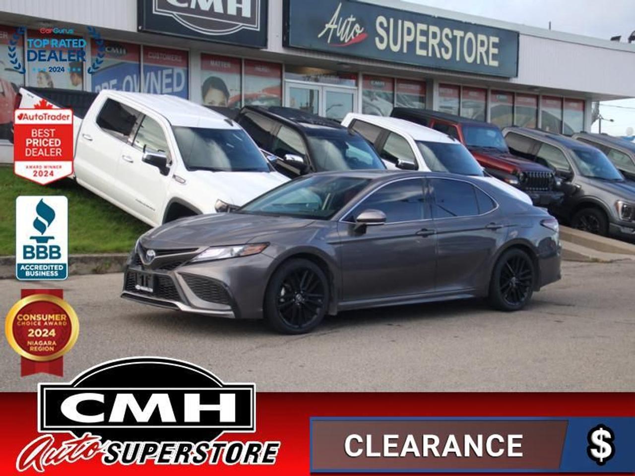 <b>LOADED HYBRID !! REAR CAMERA, LANE SENSING, BLIND SPOT, ADAPTIVE RADAR CRUISE CONTROL, COLLISION SENSORS, APPLE CARPLAY, ANDROID AUTO, SUNROOF, RED LEATHER, POWER DRIVER SEAT, HEATED SEATS, HEATED STEERING WHEEL, DUAL CLIMATE CONTROL, 19-IN ALLOYS</b><br>  <br>CMH certifies that all vehicles meet DOUBLE the Ministry standards for Brakes and Tires<br><br> <br>    This  2022 Toyota Camry is for sale today. <br> <br>Slip inside, and youll find a welcoming environment that caters to your every whim. This Toyota Camry offers captivating style, modern technology and more safety features than you would expect from a family sedan. Responsive and refined, the driving experience is at a whole new level from its previous model. This new platform has been transformed into something very unique with sharper exterior and interior lines and a powerful stance offering better stability. The Toyota Camry has become a truly unique sedan and is ready to make a big impact!This  sedan has 93,308 kms. Its  gray in colour  . It has an automatic transmission and is powered by a  208HP 2.5L 4 Cylinder Engine. <br> <br> Our Camrys trim level is XSE. Stepping up to this sporty and luxurious Camry XSE is an excellent decision as it comes fully loaded with extra style and tech features such as leather heated front seats with power adjustments, exclusive aluminum wheels, unique exterior design, Audio Plus with a larger 9 inch touchscreen display that features Apple CarPlay, Android Auto and wireless streaming audio. It also includes a power sunroof, LED headlamps with automatic highbeam assist, heated steering wheel, power heated mirrors, dual zone climate control, proximity remote keyless entry, adaptive cruise control and Toyotas Safety Sense System that consists of blind spot detection, lane change assist and lane departure warning, a pre collsion safety system and a rear view camera plus much more. This vehicle has been upgraded with the following features: Leather Seats,  Sunroof,  Sport Suspension,  Heated Seats,  Heated Steering Wheel,  Blind Spot Detection,  Apple Carplay. <br> <br>To apply right now for financing use this link : <a href=https://www.cmhniagara.com/financing/ target=_blank>https://www.cmhniagara.com/financing/</a><br><br> <br/><br>Trade-ins are welcome! Financing available OAC ! Price INCLUDES a valid safety certificate! Price INCLUDES a 60-day limited warranty on all vehicles except classic or vintage cars. CMH is a Full Disclosure dealer with no hidden fees. We are a family-owned and operated business for over 30 years! o~o