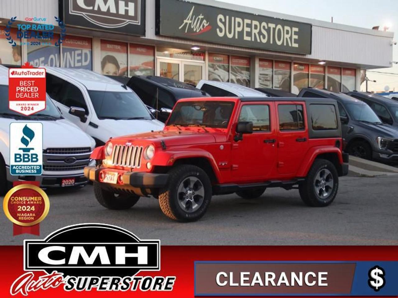 <b>GREAT COLOUR !! AUTO 4X4 !! SOFT TOP, NAVIGATION, BLUETOOTH, AUXILIARY PORT, TOUCH SCREEN, STEERING WHEEL CONTROLS, HEATED FRONT SEATS, POWER WINDOWS, POWER LOCKS, POWER MIRRORS, AIR CONDITIONING, REMOTE START, 18-INCH ALLOY WHEELS</b><br>  <br>CMH certifies that all vehicles meet DOUBLE the Ministry standards for Brakes and Tires<br><br> <br>    This  2016 Jeep Wrangler Unlimited is for sale today. <br> <br>The 2016 Jeep Wrangler Unlimited is the ultimate expression of our legacy of performance. With well-thought-out designs inside and out, the Wrangler Unlimited doesnt just look good, it is fully capable and ready to be made your own. The king of off-road vehicles offers an impressive list of standard features. The Unlimiteds exterior proudly wears its legendary heritage right down to the classic details. It even has four doors so its easy to bring family and friends along for the adventure.This  SUV has 210,698 kms. Its  red in colour  . It has an automatic transmission and is powered by a  285HP 3.6L V6 Cylinder Engine. <br> <br> Our Wrangler Unlimiteds trim level is Sahara. The 2016 Jeep Wrangler Unlimited Sahara features a heavy-duty suspension and shock absorbers, aluminum wheels, remote power doors, side steps, an Infinity 7 speaker audio system and an auxiliary input jack, air conditioning, auto-dimming rearview mirror, a leather steering wheel and tinted rear windows. This vehicle has been upgraded with the following features: Premium Audio System,  A/c,  Remote Keyless Entry,  Cruise Control. <br> To view the original window sticker for this vehicle view this <a href=http://www.chrysler.com/hostd/windowsticker/getWindowStickerPdf.do?vin=1C4BJWEG4GL182339 target=_blank>http://www.chrysler.com/hostd/windowsticker/getWindowStickerPdf.do?vin=1C4BJWEG4GL182339</a>. <br/><br> <br>To apply right now for financing use this link : <a href=https://www.cmhniagara.com/financing/ target=_blank>https://www.cmhniagara.com/financing/</a><br><br> <br/><br>Trade-ins are welcome! Financing available OAC ! Price INCLUDES a valid safety certificate! Price INCLUDES a 60-day limited warranty on all vehicles except classic or vintage cars. CMH is a Full Disclosure dealer with no hidden fees. We are a family-owned and operated business for over 30 years! o~o