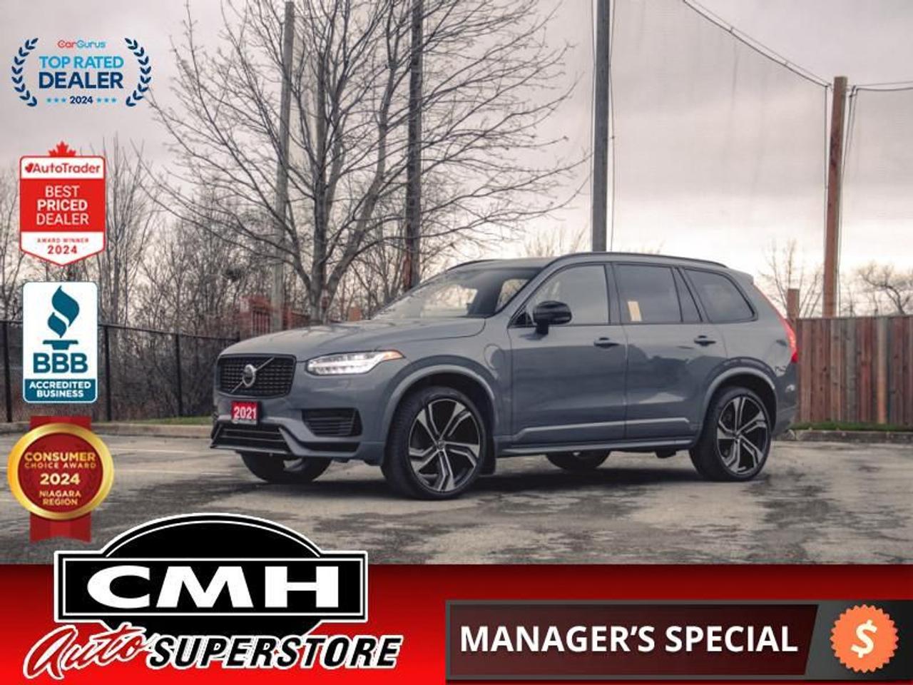 <b>PLUG-IN HYBRID !! AWD !! NAVIGATION, REAR CAMERA, PARK SENSORS, BLIND SPOT, ADAPTIVE CRUISE, LANE KEEPING, COLLISION SENSORS, AUTO HIGH BEAM, BENDING LIGHTS, PANO SUNROOF, LEATHER, POWER SEATS, HEATED SEATS, POWER LIFTGATE, 7 PASSENGER, 22-INCH ALLOYS</b><br>  <br>CMH certifies that all vehicles meet DOUBLE the Ministry standards for Brakes and Tires<br><br> <br>    This  2021 Volvo XC90 is for sale today. <br> <br>The 2021 Volvo XC90 remains one of the most stylish options among luxury SUVs, with distinctive exterior styling, superior performance, and a luxurious cabin highlighted by premium and exclusive materials that give off a ritzy feel. As with all Volvos, the 2021 XC90 is focused on safety as much as it is on luxury, with a host of driver-assistance features being standard across the board.This  SUV has 107,609 kms. Its  gray in colour  and is major accident free based on the <a href=https://vhr.carfax.ca/?id=fSxP5ruGEk+8U1Bg2FWl5pu08othD7fz target=_blank>CARFAX Report</a> . It has an automatic transmission and is powered by a  400HP 2.0L 4 Cylinder Engine. <br> <br> Our XC90s trim level is T8 eAWD R-Design.  With multiple subtle yet sporty and aggressive interior and exterior changes, this Volvo XC90 T6 AWD R-Design comes standard with a sophisticated battery-assisted powertrain paired with a clever all-wheel-drive system for maximum efficiency, with other features such as a sport tuned suspension set-up, mobile wireless charging, a tinted dual-panel sunroof with slide and tilt functionality, power heated leather/nubuck textile seats with lumbar support and memory function, a power-operated liftgate, and an intuitive navigation system with Apple CarPlay, Android Auto, and navigation. Additional features include bright LED headlights with automatic high beams, cornering assist and inbuilt LED daytime running lights, blind-spot detection, adaptive cruise control with steering assist, lane departure warning, forward collision alert, tri-zone climate control, proximity keyless with remote start, and a lot more.<br> <br>To apply right now for financing use this link : <a href=https://www.cmhniagara.com/financing/ target=_blank>https://www.cmhniagara.com/financing/</a><br><br> <br/><br>Trade-ins are welcome! Financing available OAC ! Price INCLUDES a valid safety certificate! Price INCLUDES a 60-day limited warranty on all vehicles except classic or vintage cars. CMH is a Full Disclosure dealer with no hidden fees. We are a family-owned and operated business for over 30 years! o~o
