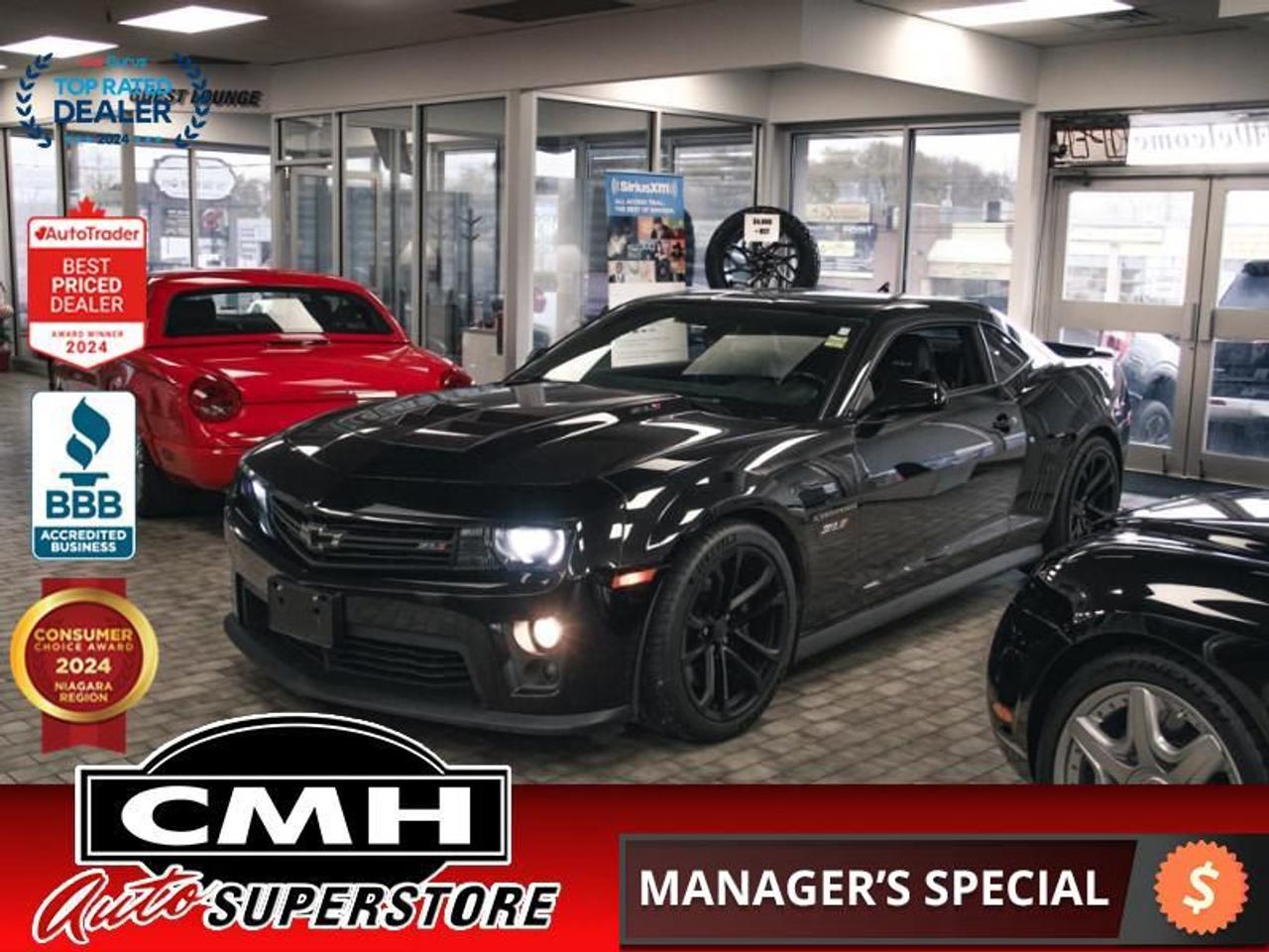 <b>BLACK ON BLACK !! 6.2L V8 SUPERCHARGED !! NAVIGATION, REAR CAMERA, PARKING SENSORS, HEADS UP DISPLAY, BLUETOOTH, STEERING WHEEL CONTROLS, LEATHER, POWER DRIVER SEAT, BOSTON PREMIUM AUDIO, HOOD SCOOP, SPORT GAUGES, REMOTE START, 20-INCH ALLOY WHEELS</b><br>  <br>CMH certifies that all vehicles meet DOUBLE the Ministry standards for Brakes and Tires<br><br> <br>    This  2014 Chevrolet Camaro is for sale today. <br> <br>For tire-burning power and Hollywood looks, it doesnt get much better than the 2014 Chevrolet Camaro. For the 2014 Chevrolet Camaro, youll instantly spot the cars sleeker front grille, new headlights and taillights, and minor changes all around. But the return of the Z/28 moniker adds a whole new level to Camaro performance this year.This  coupe has 114,150 kms. Its  black in colour  and is major accident free based on the <a href=https://vhr.carfax.ca/?id=w83BPrsZC5kEUjGBhTwoo2+6lIZITPKw target=_blank>CARFAX Report</a> . It has an automatic transmission and is powered by a  580HP 6.2L 8 Cylinder Engine. <br> <br>To apply right now for financing use this link : <a href=https://www.cmhniagara.com/financing/ target=_blank>https://www.cmhniagara.com/financing/</a><br><br> <br/><br>Trade-ins are welcome! Financing available OAC ! Price INCLUDES a valid safety certificate! Price INCLUDES a 60-day limited warranty on all vehicles except classic or vintage cars. CMH is a Full Disclosure dealer with no hidden fees. We are a family-owned and operated business for over 30 years! o~o