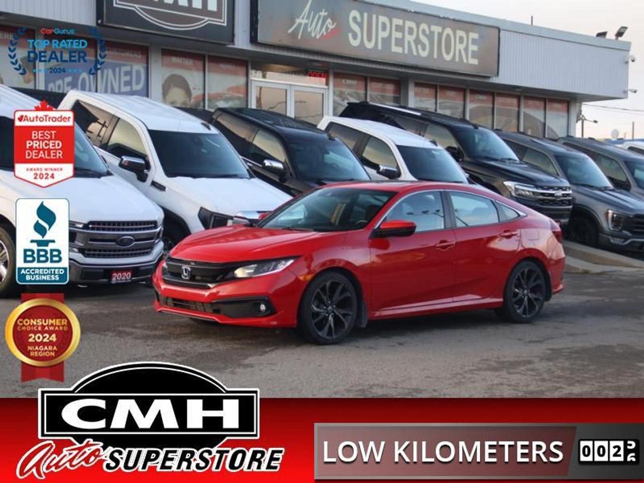 <b>ONLY 32,000 KMS !! REAR CAMERA, LANE KEEPING, ADAPTIVE CRUISE CONTROL, APPLE CARPLAY, ANDROID AUTO, SUNROOF, LEATHER/CLOTH, POWER DRIVER SEAT, HEATED SEATS, DUAL CLIMATE CONTROL, REMOTE START, PROXIMITY KEY, BUTTON START, 18-INCH ALLOY WHEELS</b><br>  <br>CMH certifies that all vehicles meet DOUBLE the Ministry standards for Brakes and Tires<br><br> <br>    This  2019 Honda Civic Sedan is for sale today. <br> <br>With harmonious power, excellent handling capability, plus its engaging driving dynamic, this 2019 Honda Civic is a highly compelling choice in the eco-friendly compact car segment. Regardless of your style preference or driving habits, this impressive Honda Civic will perfectly suit your wants and needs. The Civic offers the right amount of cargo space, an aggressive exterior design with sporty and sleek body lines, plus a comfortable and ergonomic interior layout that works well with all family sizes. This Civic easily makes a bold statement without saying a word! This low mileage  sedan has just 31,951 kms. Its  red in colour  and is major accident free based on the <a href=https://vhr.carfax.ca/?id=t0OnDCdSmykPpL9FWWs8Jb+r/PKT4rEi target=_blank>CARFAX Report</a> . It has an automatic transmission and is powered by a  158HP 2.0L 4 Cylinder Engine. <br> <br> Our Civic Sedans trim level is Sport CVT. Stepping up to this Sport Civic gets you some great features for luxury and performance with a power moonroof, leather steering wheel, proximity key, aluminum trimmed sport pedals, fog lights, blind spot display, and paddle shifters. Other standard features include collision mitigation with forward collision warning, lane keep assist with road departure mitigation, adaptive cruise control, straight driving assist for slopes, and automatic highbeams. The interior is as comfy and advanced as you need with heated front seats, remote start, Apple CarPlay, Android Auto, Bluetooth, Siri EyesFree, WiFi tethering, steering wheel with cruise and audio controls, multi-angle rearview camera, 7 inch driver information display, and automatic climate control. The exterior has some great style with aluminum wheels, independent suspension, heated power side mirrors, and LED taillamps.<br> <br>To apply right now for financing use this link : <a href=https://www.cmhniagara.com/financing/ target=_blank>https://www.cmhniagara.com/financing/</a><br><br> <br/><br>Trade-ins are welcome! Financing available OAC ! Price INCLUDES a valid safety certificate! Price INCLUDES a 60-day limited warranty on all vehicles except classic or vintage cars. CMH is a Full Disclosure dealer with no hidden fees. We are a family-owned and operated business for over 30 years! o~o
