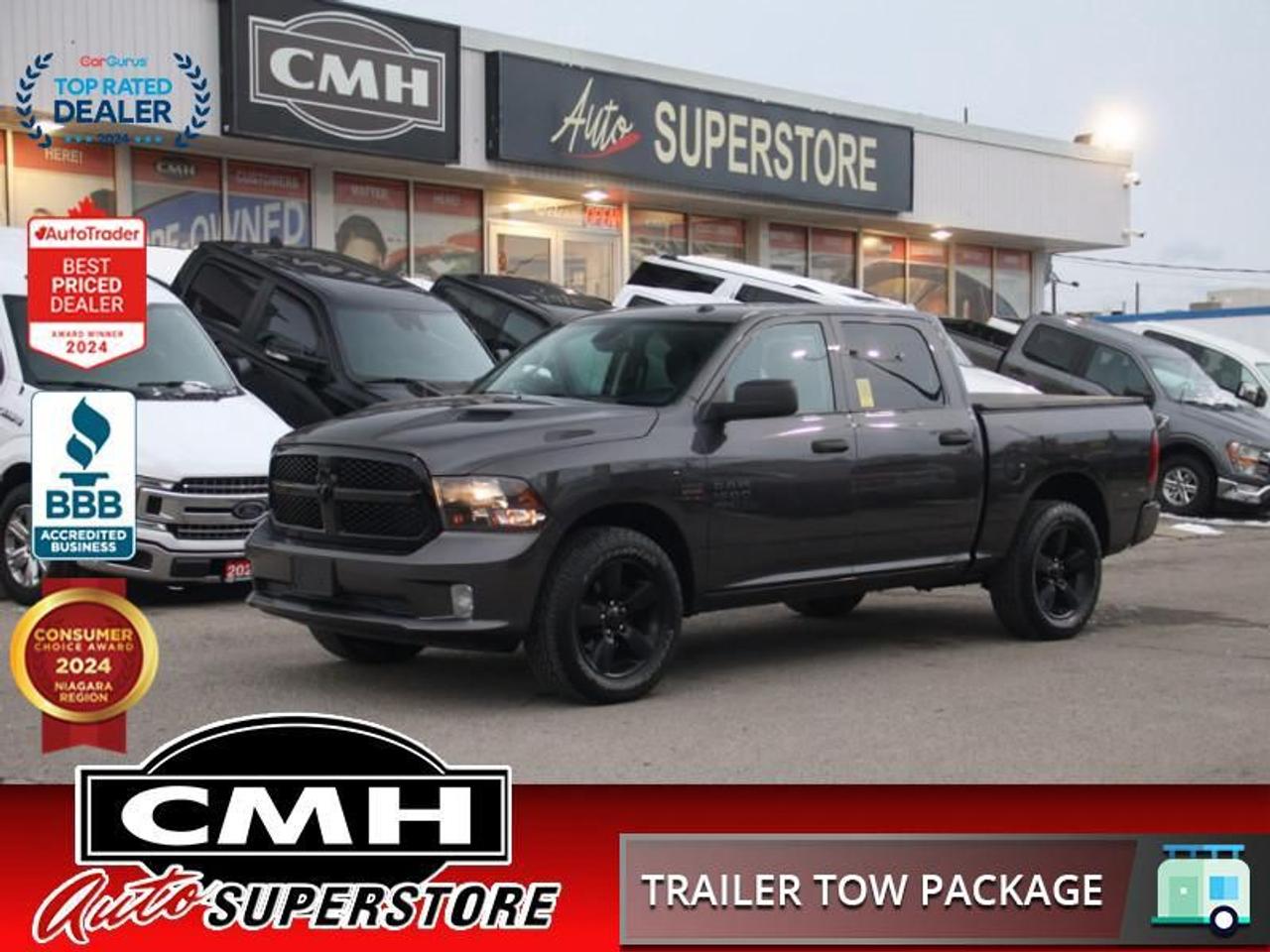 <b>5.7L HEMI !! CREW 4X4 !! REAR CAMERA, PARKING SENSOR, APPLE CARPLAY, ANDROID AUTO, BLUETOOTH, STEERING WHEEL CONTROLS, BUCKETS, POWER DRIVER SEAT, DUAL CLIMATE CONTROL, REMOTE START, TOWING CONTROLLER, SOFT TONNEAU, SPRAY LINER, 20-INCH ALLOY WHEELS</b><br>  <br>CMH certifies that all vehicles meet DOUBLE the Ministry standards for Brakes and Tires<br><br> <br>    This  2022 Ram 1500 Classic is for sale today. <br> <br>The reasons why this Ram 1500 Classic stands above its well-respected competition are evident: uncompromising capability, proven commitment to safety and security, and state-of-the-art technology. From its muscular exterior to the well-trimmed interior, this 2022 Ram 1500 Classic is more than just a workhorse. Get the job done in comfort and style while getting a great value with this amazing full size truck. This  Crew Cab 4X4 pickup  has 84,378 kms. Its  gray in colour  and is major accident free based on the <a href=https://vhr.carfax.ca/?id=qruu951PwoEgRq9WuWjiiPZ3L9QCAhNJ target=_blank>CARFAX Report</a> . It has an automatic transmission and is powered by a  395HP 5.7L 8 Cylinder Engine. <br> <br> Our 1500 Classics trim level is Express. Upgrading to this rugged 1500 Classic Express is a great choice as it comes loaded with stylish aluminum wheels, body colored bumpers, front fog lights, heavy-duty shock absorbers, electronic stability control and trailer sway control. Additional features include ParkView rear back-up camera, cruise control, air conditioning, an infotainment hub with SiriusXM, radio 3.0 and a USB port, automatic headlights, power windows, power doors, and more.<br> To view the original window sticker for this vehicle view this <a href=http://www.chrysler.com/hostd/windowsticker/getWindowStickerPdf.do?vin=3C6RR7KT1NG301349 target=_blank>http://www.chrysler.com/hostd/windowsticker/getWindowStickerPdf.do?vin=3C6RR7KT1NG301349</a>. <br/><br> <br>To apply right now for financing use this link : <a href=https://www.cmhniagara.com/financing/ target=_blank>https://www.cmhniagara.com/financing/</a><br><br> <br/><br>Trade-ins are welcome! Financing available OAC ! Price INCLUDES a valid safety certificate! Price INCLUDES a 60-day limited warranty on all vehicles except classic or vintage cars. CMH is a Full Disclosure dealer with no hidden fees. We are a family-owned and operated business for over 30 years! o~o