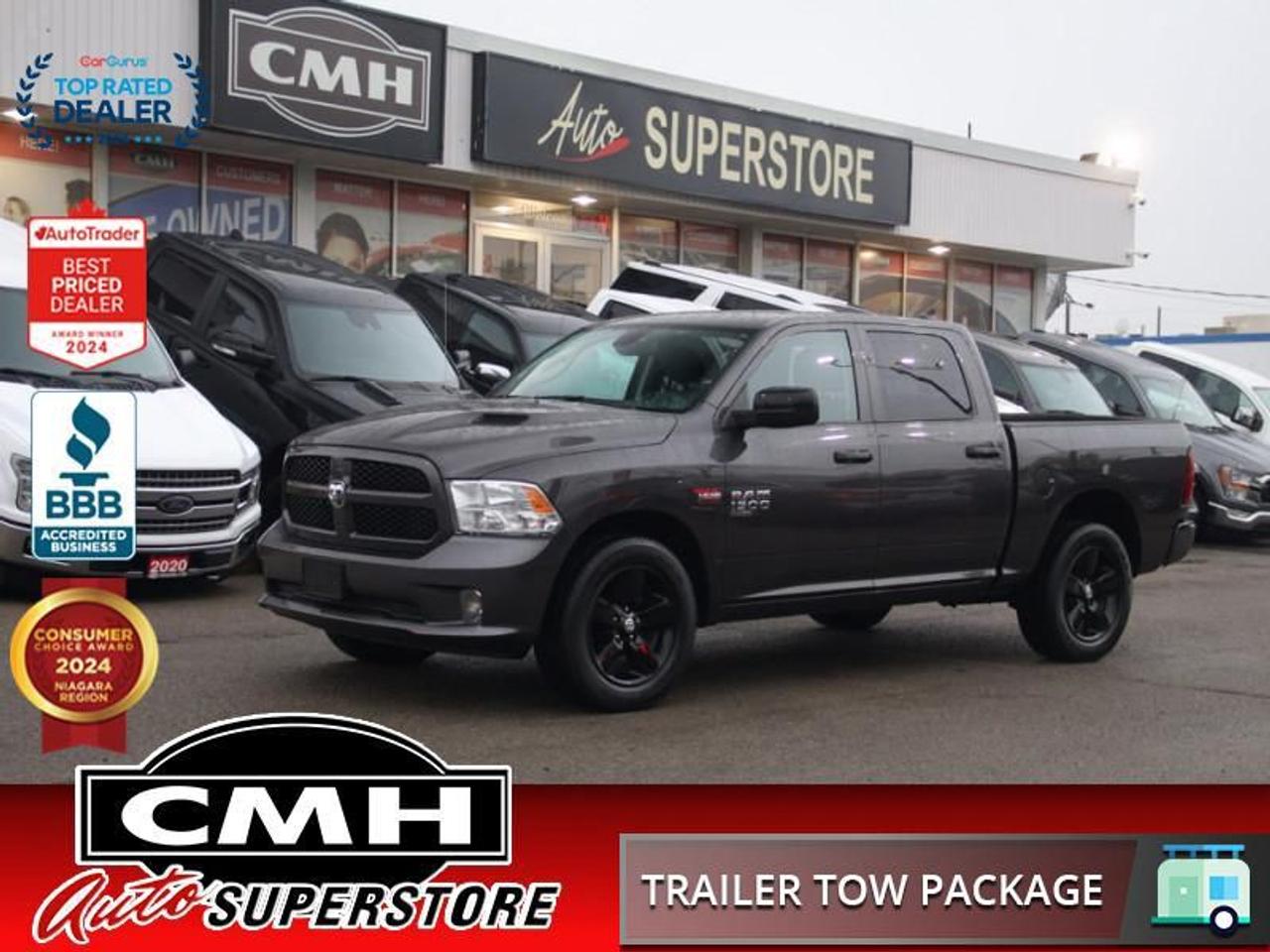 <b>BLACKOUT PACKAGE !! 5.7L HEMI !! REAR CAMERA, PARK SENSORS, APPLE CARPLAY, ANDROID AUTO, 8.4-INCH DISPLAY, STEERING WHEEL CONTROLS, CRUISE CONTROL, DUAL CLIMATE CONTROL, TOWING CONTROLLER, MOPAR SPORT HOOD, DUAL EXHAUST W/ BRIGHT TIPS, 20-INCH ALLOYS</b><br>  <br>CMH certifies that all vehicles meet DOUBLE the Ministry standards for Brakes and Tires<br><br> <br>    This  2022 Ram 1500 Classic is for sale today. <br> <br>The reasons why this Ram 1500 Classic stands above its well-respected competition are evident: uncompromising capability, proven commitment to safety and security, and state-of-the-art technology. From its muscular exterior to the well-trimmed interior, this 2022 Ram 1500 Classic is more than just a workhorse. Get the job done in comfort and style while getting a great value with this amazing full size truck. This  Crew Cab 4X4 pickup  has 52,078 kms. Its  gray in colour  and is major accident free based on the <a href=https://vhr.carfax.ca/?id=uYG1OeoA1+Gyw7kgcolljQkyYpHyA4UV target=_blank>CARFAX Report</a> . It has an automatic transmission and is powered by a  395HP 5.7L 8 Cylinder Engine. <br> <br> Our 1500 Classics trim level is Express. Upgrading to this rugged 1500 Classic Express is a great choice as it comes loaded with stylish aluminum wheels, body colored bumpers, front fog lights, heavy-duty shock absorbers, electronic stability control and trailer sway control. Additional features include ParkView rear back-up camera, cruise control, air conditioning, an infotainment hub with SiriusXM, radio 3.0 and a USB port, automatic headlights, power windows, power doors, and more.<br> To view the original window sticker for this vehicle view this <a href=http://www.chrysler.com/hostd/windowsticker/getWindowStickerPdf.do?vin=1C6RR7KT6NS145608 target=_blank>http://www.chrysler.com/hostd/windowsticker/getWindowStickerPdf.do?vin=1C6RR7KT6NS145608</a>. <br/><br> <br>To apply right now for financing use this link : <a href=https://www.cmhniagara.com/financing/ target=_blank>https://www.cmhniagara.com/financing/</a><br><br> <br/><br>Trade-ins are welcome! Financing available OAC ! Price INCLUDES a valid safety certificate! Price INCLUDES a 60-day limited warranty on all vehicles except classic or vintage cars. CMH is a Full Disclosure dealer with no hidden fees. We are a family-owned and operated business for over 30 years! o~o