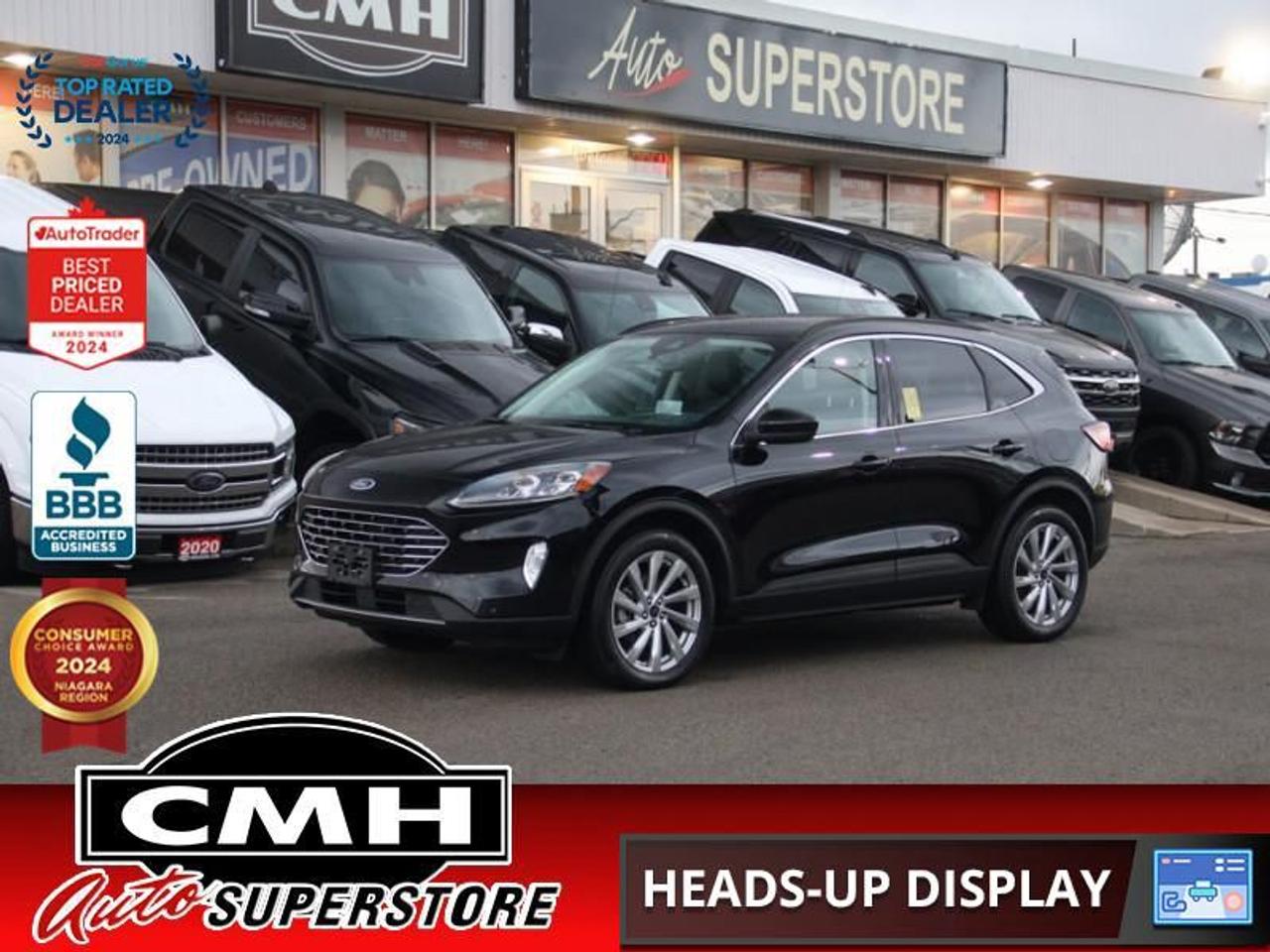 <b>LOADED AWD !! NAVIGATION, REAR CAMERA, PARK SENSORS, COLLISION SENSORS, ADAPTIVE CRUISE CONTROL, BLIND SPOT, HEADS UP DISPLAY, WIRELESS PHONE CHARGER, PANORAMIC SUNROOF, LEATHER, HEATED SEATS, HEATED STEERING WHEEL, POWER LIFTGATE, AUTO HIGH BEAM<br></b><br>  <br>CMH certifies that all vehicles meet DOUBLE the Ministry standards for Brakes and Tires<br><br> <br>    This  2022 Ford Escape is for sale today. <br> <br>The Ford Escape was built for an active lifestyle and offers plenty of options for you to hit the road in your own individual style. Whether you need a family SUV for soccer practice, a capable adventure vehicle, or both, the versatile Ford Escape has you covered. Built for those who live on the go, the Ford Escape was made to be unstoppable.This  SUV has 62,769 kms. Its  black in colour  and is major accident free based on the <a href=https://vhr.carfax.ca/?id=kZA+BsytI7GxMGQHXpUZMg5D6m0CsdyH target=_blank>CARFAX Report</a> . It has an automatic transmission and is powered by a  200HP 2.5L 4 Cylinder Engine. <br> <br> Our Escapes trim level is Titanium Hybrid. Stepping up to this premium Ford Escape Titanium Hybrid is a great choice as it comes fully loaded with heated sport contour premium seats that are powered in the front, exclusive aluminum wheels and Fords SYNC 3 infotainment system complete with a large touchscreen, integrated navigation, Apple CarPlay and Android Auto. Additional features include a power rear liftgate, heated leatherette steering wheel, SiriusXM radio paired with a premium Bang and Olufsen audio system, FordPass Connect 4G LTE, automatic climate control, a smart device remote starter plus unique exterior accents. For added convenience and safety this Ford Escape also comes with active park assist, Ford Co-Pilot360 that features lane keep assist, active park assist, blind spot detection, automatic emergency braking with evasion assist and cross traffic alert plus so much more.<br> To view the original window sticker for this vehicle view this <a href=http://www.windowsticker.forddirect.com/windowsticker.pdf?vin=1FMCU9DZ6NUA75182 target=_blank>http://www.windowsticker.forddirect.com/windowsticker.pdf?vin=1FMCU9DZ6NUA75182</a>. <br/><br> <br>To apply right now for financing use this link : <a href=https://www.cmhniagara.com/financing/ target=_blank>https://www.cmhniagara.com/financing/</a><br><br> <br/><br>Trade-ins are welcome! Financing available OAC ! Price INCLUDES a valid safety certificate! Price INCLUDES a 60-day limited warranty on all vehicles except classic or vintage cars. CMH is a Full Disclosure dealer with no hidden fees. We are a family-owned and operated business for over 30 years! o~o