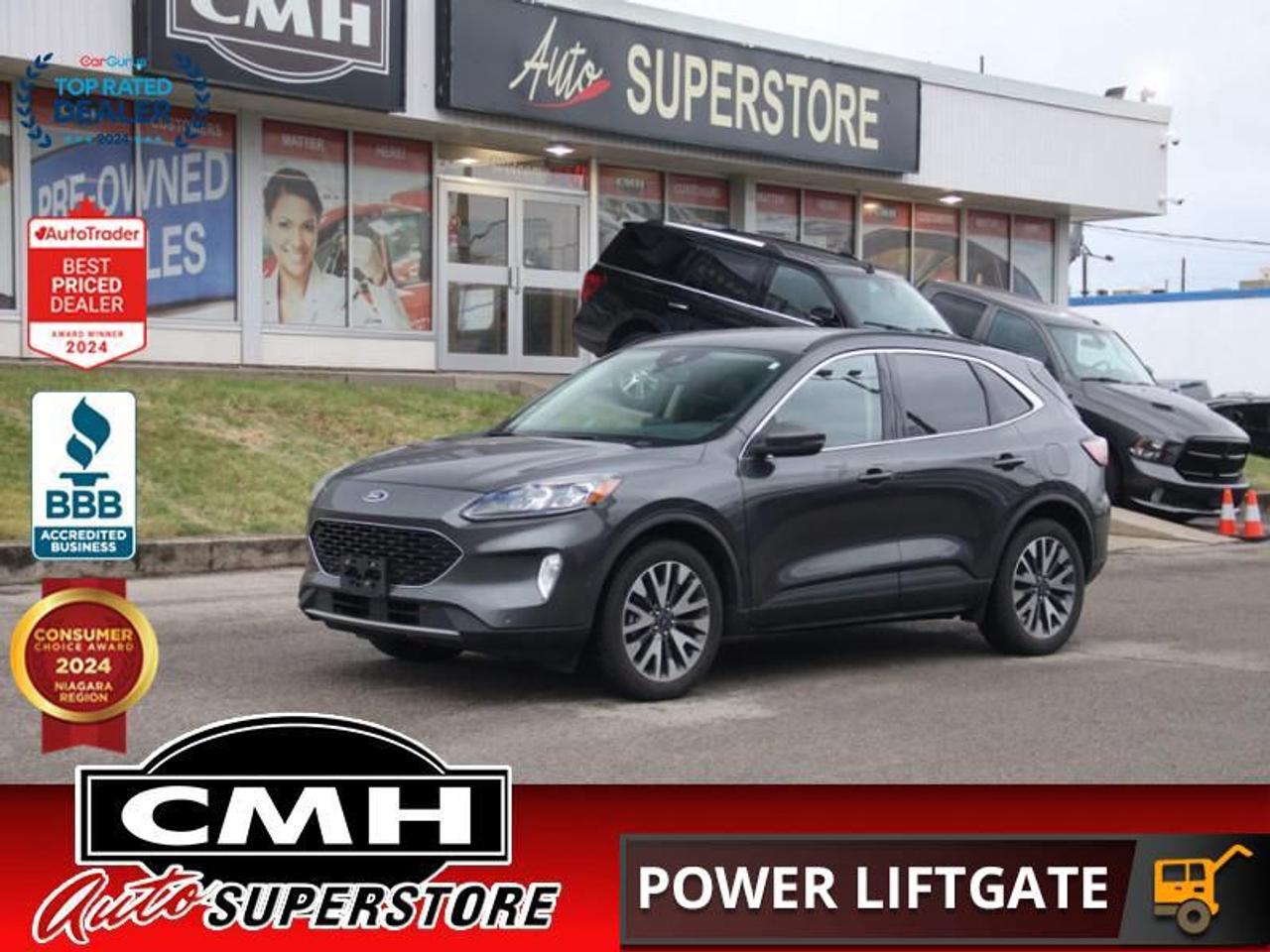 <b>LOADED AWD !! NAVIGATION, REAR CAMERA, LANE KEEPING, PARKING SENSORS, BLIND SPOT, ADAPTIVE CRUISE CONTROL, APPLE CARPLAY, ANDROID AUTO, POWER SEATS W/ DRIVER MEMORY, HEATED SEATS, HEATED STEERING WHEEL, POWER LIFTGATE, REMOTE START, 19-IN ALLOYS</b><br>  <br>CMH certifies that all vehicles meet DOUBLE the Ministry standards for Brakes and Tires<br><br> <br>    This  2020 Ford Escape is for sale today. <br> <br>All new for 2020, the Ford Escape was built for an active lifestyle and offers plenty of options for you to hit the road in your own individual style. Whether you need a family SUV for soccer practice, a capable adventure vehicle, or both, the versatile Ford Escape has you covered. Built for those who live on the go, the Ford Escape was made to be unstoppable.This  SUV has 181,359 kms. Its  grey in colour  and is major accident free based on the <a href=https://vhr.carfax.ca/?id=6VIOanoF66OKu9r0T1uNvPoUJ0jf5d+2 target=_blank>CARFAX Report</a> . It has an automatic transmission and is powered by a  250HP 2.0L 4 Cylinder Engine. <br> <br> Our Escapes trim level is Titanium. Stepping up to this premium Ford Escape Titanium is a wise choice as it comes fully loaded with heated sport contour leather seats that are powered in the front, exclusive aluminum wheels and Fords SYNC 3 infotainment system complete with wireless charging, a large touchscreen, integrated navigation, Apple CarPlay and Android Auto. Additional features include a power rear liftgate, heated leather steering wheel, SiriusXM radio paired with a premium Bang and Olufsen audio system, FordPass Connect 4G LTE, automatic climate control, a smart device remote starter plus unique exterior accents. For added convenience and safety this Ford Escape also comes with Ford Co-Pilot360 that features lane keep assist, active park assist, blind spot detection, automatic emergency braking and cross traffic alert.<br> To view the original window sticker for this vehicle view this <a href=http://www.windowsticker.forddirect.com/windowsticker.pdf?vin=1FMCU9J91LUA60266 target=_blank>http://www.windowsticker.forddirect.com/windowsticker.pdf?vin=1FMCU9J91LUA60266</a>. <br/><br> <br>To apply right now for financing use this link : <a href=https://www.cmhniagara.com/financing/ target=_blank>https://www.cmhniagara.com/financing/</a><br><br> <br/><br>Trade-ins are welcome! Financing available OAC ! Price INCLUDES a valid safety certificate! Price INCLUDES a 60-day limited warranty on all vehicles except classic or vintage cars. CMH is a Full Disclosure dealer with no hidden fees. We are a family-owned and operated business for over 30 years! o~o