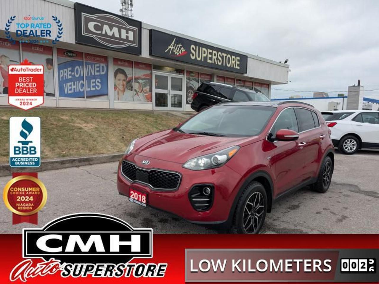 <b>ONLY 70,000 KMS !! AWD !! NAVIGATION, REAR CAMERA, CROSS TRAFFIC ALERT, LANE DEPARTURE, BLIND SPOT, APPLE CARPLAY, ANDROID AUTO, PANORAMIC SUNROOF, LEATHER, POWER DRIVER SEAT, HEATED SEATS, HEATED STEERING WHEEL, DUAL CLIMATE, POWER GATE, 17-IN ALLOYS</b><br>  <br>CMH certifies that all vehicles meet DOUBLE the Ministry standards for Brakes and Tires<br><br> <br>    This  2018 Kia Sportage is for sale today. <br> <br>With bold features and an imposing stance, the rebellious appearance of the 2018 Sportage naturally complements your active lifestyle. Go anywhere in this beautifully designed Sportage and bring the family with you. With seating for 5 adults and plenty of cargo space, the Sportage is the do everything kind of vehicle. It delivers impressive efficiency, agile handling and top notch safety features that are second to none. This low mileage  SUV has just 69,610 kms. Its  red in colour  and is completely accident free based on the <a href=https://vhr.carfax.ca/?id=sXLV9csN8SRFSwvoFs27c+Prn042ic1j target=_blank>CARFAX Report</a> . It has an automatic transmission and is powered by a  181HP 2.4L 4 Cylinder Engine. <br> <br> Our Sportages trim level is EX Tech AWD. This EX Tech with AWD is a step up in the Sportage range with an array of luxury and modern options. Features include full time all wheel drive, a massive power sunroof, build in navigation on an 8 inch integrated display screen, a power tailgate, a Harman/Kardon premium audio system with Sirius XM satellite radio, Bluetooth streaming audio, Apple CarPlay and Android Auto, leather seats, heated and cooled front bucket seats with a 10-way power driver seat, heated steering wheel, a proximity key for push button start, front and rear parking sensors, blind spot sensors, lane departure warning, back up camera plus it even comes with a forward and rear collision warning system! <br> <br>To apply right now for financing use this link : <a href=https://www.cmhniagara.com/financing/ target=_blank>https://www.cmhniagara.com/financing/</a><br><br> <br/><br>Trade-ins are welcome! Financing available OAC ! Price INCLUDES a valid safety certificate! Price INCLUDES a 60-day limited warranty on all vehicles except classic or vintage cars. CMH is a Full Disclosure dealer with no hidden fees. We are a family-owned and operated business for over 30 years! o~o