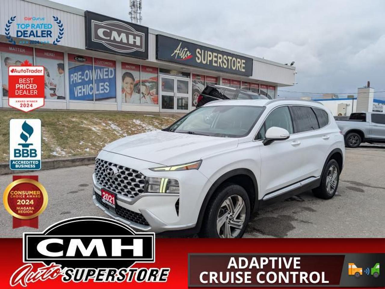 <b>ALL WHEEL DRIVE !! REAR CAMERA, PARKING SENSORS, BLIND SPOT, FORWARD SAFETY, LANE SAFETY, ADAPTIVE CRUISE CONTROL, APPLE CARPLAY, ANDROID AUTO, STEERING WHEEL CONTROLS, HEATED SEATS, HEATED STEERING WHEEL, DUAL CLIMATE CONTROL, REMOTE START, 18-INCH ALLOY</b><br>  <br>CMH certifies that all vehicles meet DOUBLE the Ministry standards for Brakes and Tires<br><br> <br>    This  2021 Hyundai Santa Fe is for sale today. <br> <br>The Hyundai Santa Fe is all about making your drive safer. Beyond the solid chassis, you are surrounded by a suite of available driver assistance technologies actively scanning your surroundings to help keep you safe on your journeys. Theyve been developed to help alert you to, and even avoid, unexpected dangers on the road and include the worlds first Safe Exit Assist technology. Discover an SUV that helps you protect not only you and your passengers, but also the people around you. This  SUV has 164,259 kms. Its  white in colour  . It has an automatic transmission and is powered by a  191HP 2.5L 4 Cylinder Engine. <br> <br> Our Santa Fes trim level is Preferred AWD. This Santa Fe Preferred has all the driver assistance and safety features you could need with active blind spot and rear cross traffic assistance, parking distance assist, dual zone automatic climate control, proximity key entry. Other features include forward collision mitigation with pedestrian detection, adaptive cruise control with stop and go, lane keep assist, automatic high beams, a touchscreen, Android Auto, Apple CarPlay, heated seats and steering wheel, Bluetooth, automatic headlamps, LED accent lighting, drive mode select, and aluminum wheels<br> <br>To apply right now for financing use this link : <a href=https://www.cmhniagara.com/financing/ target=_blank>https://www.cmhniagara.com/financing/</a><br><br> <br/><br>Trade-ins are welcome! Financing available OAC ! Price INCLUDES a valid safety certificate! Price INCLUDES a 60-day limited warranty on all vehicles except classic or vintage cars. CMH is a Full Disclosure dealer with no hidden fees. We are a family-owned and operated business for over 30 years! o~o