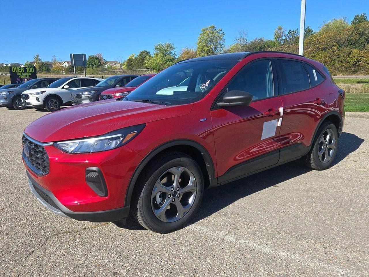 <p>Looking for an SUV that blends sporty style with practical features? Feast your eyes on the all-new 2026 Ford Escape ST-LINE, available now at Expressway Motors Ltd.! This head-turning SUV boasts a vibrant Rapid Red Metallic Tinted Clearcoat exterior and a comfortable Ebony interior featuring heated partial vinyl and cloth sport front seats, making every journey a pleasure. Its sleek design and modern features are sure to impress.</p><p>This Escape is loaded with features designed to elevate your driving experience. The automatic transmission ensures smooth gear changes, while the spacious SUV/Crossover body style provides ample room for passengers and cargo. Perfect for daily commutes or weekend adventures, this new Ford Escape is ready to take on whatever the road throws your way.</p><p>Here are five features that make this 2026 Ford Escape ST-LINE a must-see:</p><ul><li><strong>Panoramic Sunroof:</strong> Soak in the sunshine and enjoy breathtaking views with the expansive panoramic sunroof.</li><li><strong>Navigation System:</strong> Get where you need to go with ease with the built-in navigation system.</li><li><strong>Adaptive Cruise Control:</strong> Enjoy a more relaxed and safer drive with adaptive cruise control that automatically adjusts your speed to maintain a safe distance from other vehicles.</li><li><strong>Sporty ST-LINE Trim:</strong> Embrace a bold and dynamic look that will turn heads wherever you go.</li><li><strong>Heated Front Seats:</strong> Stay warm and cozy even on the coldest days.</li></ul><p><strong><em>Powered by AutoIntelligence&trade;</em></strong> Vehicle information has been generated using artificial intelligence and is provided for informational purposes only. While efforts are made to ensure accuracy, please confirm all details directly with the dealer.</p>
