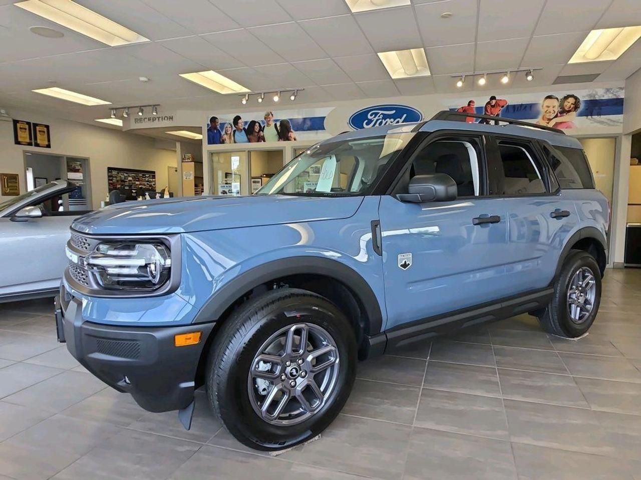 <p>Looking for adventure? Then check out this brand new 2025 Ford Bronco Sport Big Bend from Expressway Motors Ltd.! This rugged and stylish SUV is ready to take on anything the Canadian landscape throws your way. The Azure Grey Metallic Tri-Coat exterior turns heads, while the Medium Lt Smoked Truffle cloth interior offers comfort and a touch of sophistication. With its 4-wheel drive and automatic transmission, youll be prepared for any journey, whether its a weekend getaway to the cottage or your daily commute.</p><p>This Bronco Sport Big Bend is packed with features designed for both convenience and excitement. The four-door design offers easy access for passengers, and with its gasoline engine, youll be ready to hit the road. This vehicle is more than just transportation; its a statement. Its blend of capability, comfort, and head-turning style makes it the perfect vehicle for those who want to live life to the fullest.</p><p>Here are a few of the exciting features that make this Bronco Sport a must-see:</p><ul><li><strong>Heated Seats:</strong> Experience the ultimate comfort on those chilly Canadian mornings.</li><li><strong>Remote Start:</strong> Warm up your Bronco Sport from the comfort of your home or office.</li><li><strong>Fog Lights:</strong> Conquer any weather with enhanced visibility.</li><li><strong>4-wheel Drive:</strong> Tackle any terrain with confidence.</li><li><strong>Eye-catching Azure Grey Metallic Tri-Coat paint:</strong> Turn heads wherever you go.</li></ul><p><strong><em>Powered by AutoIntelligence&trade;</em></strong> Vehicle information has been generated using artificial intelligence and is provided for informational purposes only. While efforts are made to ensure accuracy, please confirm all details directly with the dealer.</p>