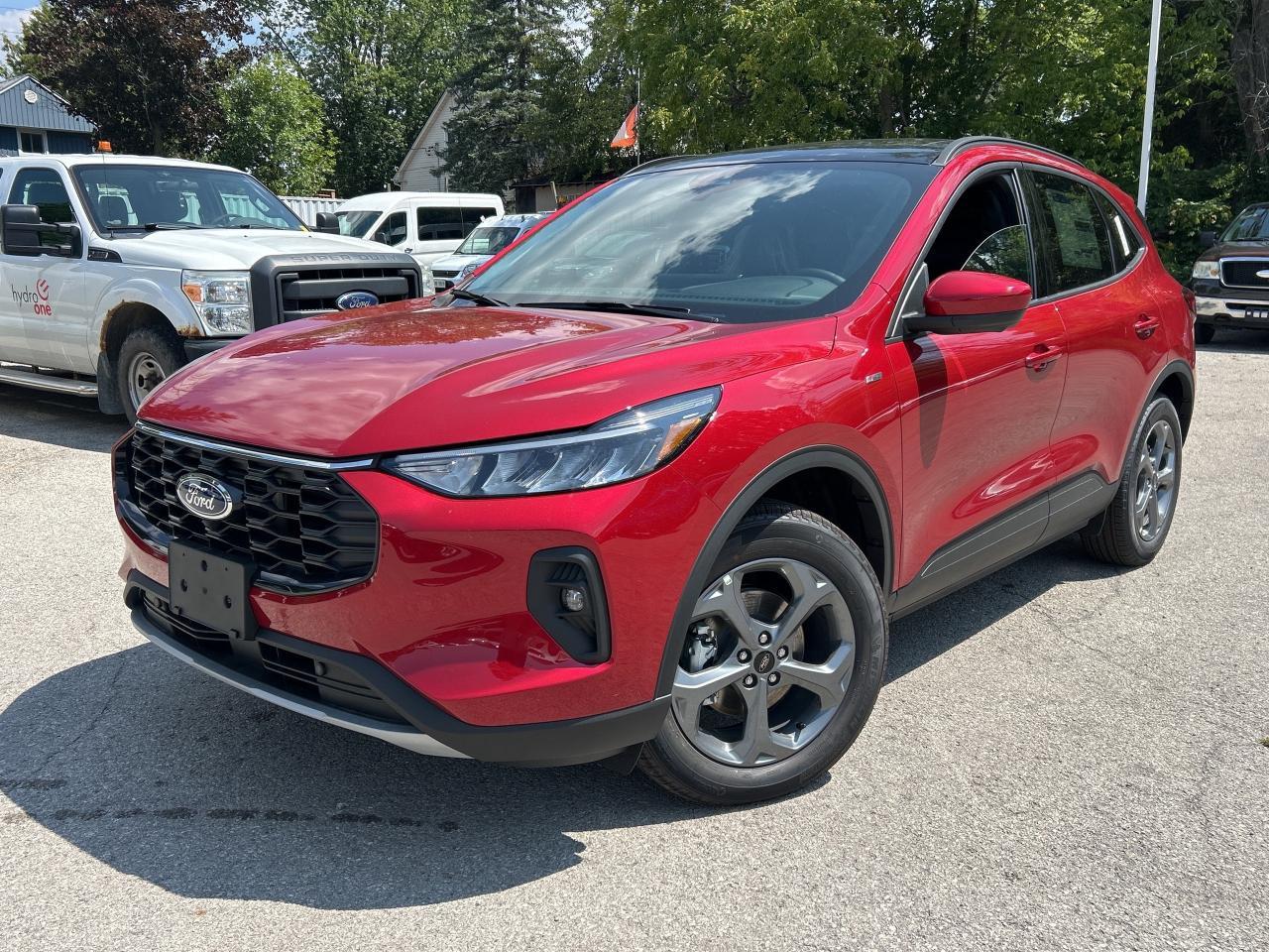 Remote Start, Heated Seats, Apple CarPlay, Android Auto, Power Liftgate, Blind Spot Detection, Lane Keep Assist, Lane Departure Warning, Forward Collision Alert, LED Lights, 4G Wi-Fi, Proximity Key, Climate Control, Rear Camera           Why Buy From Winegard Ford?   * No Administration fees  * No Additional Charges for Factory Orders  * 100 Point Inspection on All Used Vehicles  * Full Tank of Fuel with Every New or Used Vehicle Purchase  * Licensed Ford Accessories Available  *  Window Tinting Available  * Custom Truck Lift and Leveling Packages Available         Unique and classy, this Ford Escape offers everything youre looking for in a mid sized SUV.      This Ford Escape was built for an active lifestyle and offers plenty of options for you to hit the road in your own individual style. Whether you need a family SUV for soccer practice, a capable adventure vehicle, or both, the versatile Ford Escape has you covered. Built for those who live on the go, the 2025 Ford Escape is made to be unstoppable.      This rapid red metallic tinted clearcoat SUV  has a cvt transmission and is powered by a  192HP 2.5L 4 Cylinder Engine.      Our Escapes trim level is ST-Line Select. This ST-Line Select AWD features heated front seats and remote engine start, as well as aluminum wheels, body colored exterior styling and ActiveX synthetic leather seating upholstery, and amazing standard features such as a power-operated liftgate for rear cargo access, LED headlights with automatic high beams, an 8-inch infotainment screen powered by SYNC 4 with wireless Apple CarPlay and Android Auto, FordPass Connect with 4G mobile internet hotspot access, and proximity keyless entry with push button start. Road safety features include blind spot detection, pre-collision assist with automatic emergency braking and a back-up camera, lane keeping assist, lane departure warning, and front and rear collision mitigation. Additional features include dual-zone climate control, front and rear cupholders, smart device remote engine start, and even more.      View the original window sticker for this vehicle with this url http://www.windowsticker.forddirect.com/windowsticker.pdf?vin=1FMCU9NZ3SUB54657.     To apply right now for financing use this link : http://www.winegardford.com/financing/application.htm         Total  rebate of $4000 is reflected in the price.   5.99% financing for 84 months.    Buy this vehicle now for the lowest bi-weekly payment of $366.65 with $0 down for 84 months @ 5.99% APR O.A.C. ( taxes included, $22 documentation fee   / Total cost of borrowing $12274   ).  Incentives expire 2025-12-10.  See dealer for details.       o~o